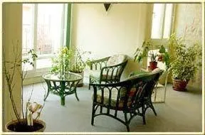 Communal lounge/ TV room in Hotel de Bordeaux