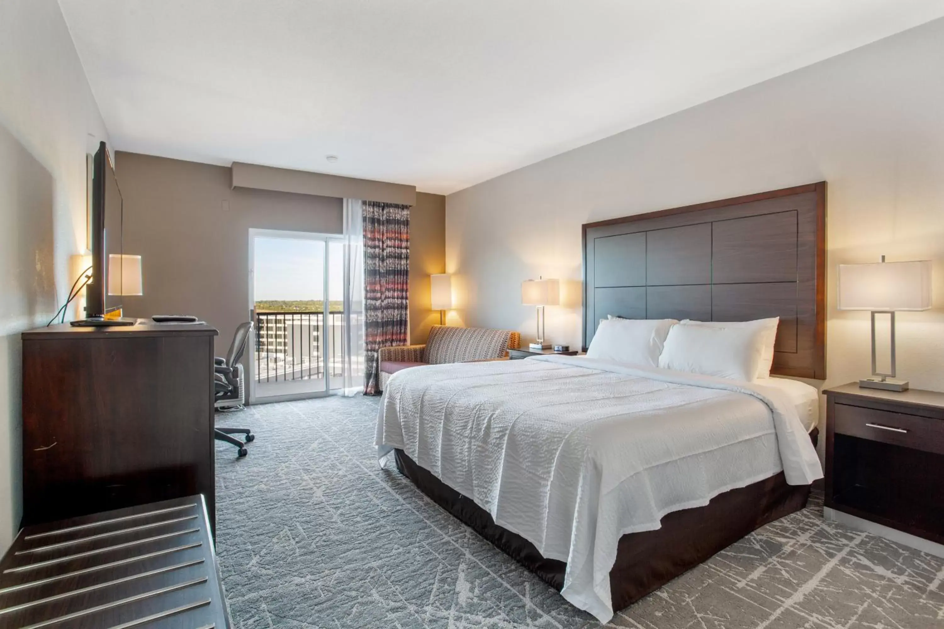 Bedroom, Bed in Orangewood Inn & Suites Kansas City Airport