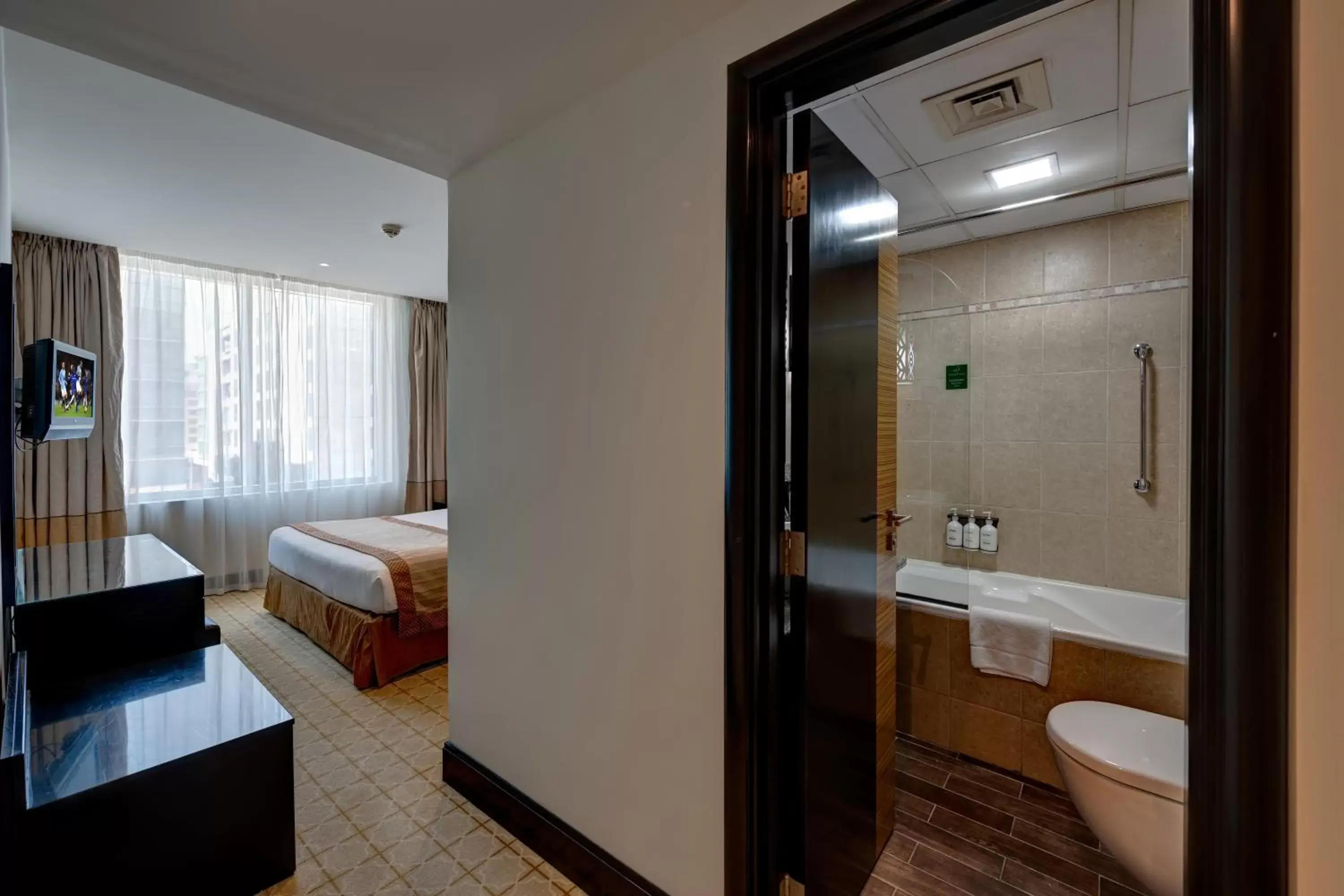 Bedroom, Bathroom in Holiday Inn Dubai Al Barsha, an IHG Hotel