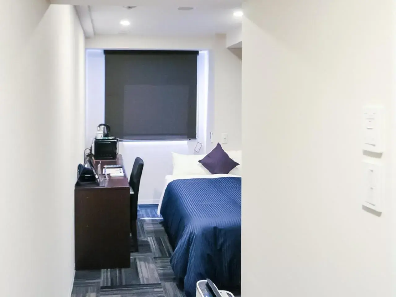 Bed in HOTEL LiVEMAX Takadanobaba Ekimae Bed in HOTEL LiVEMAX Takadanobaba Ekimae