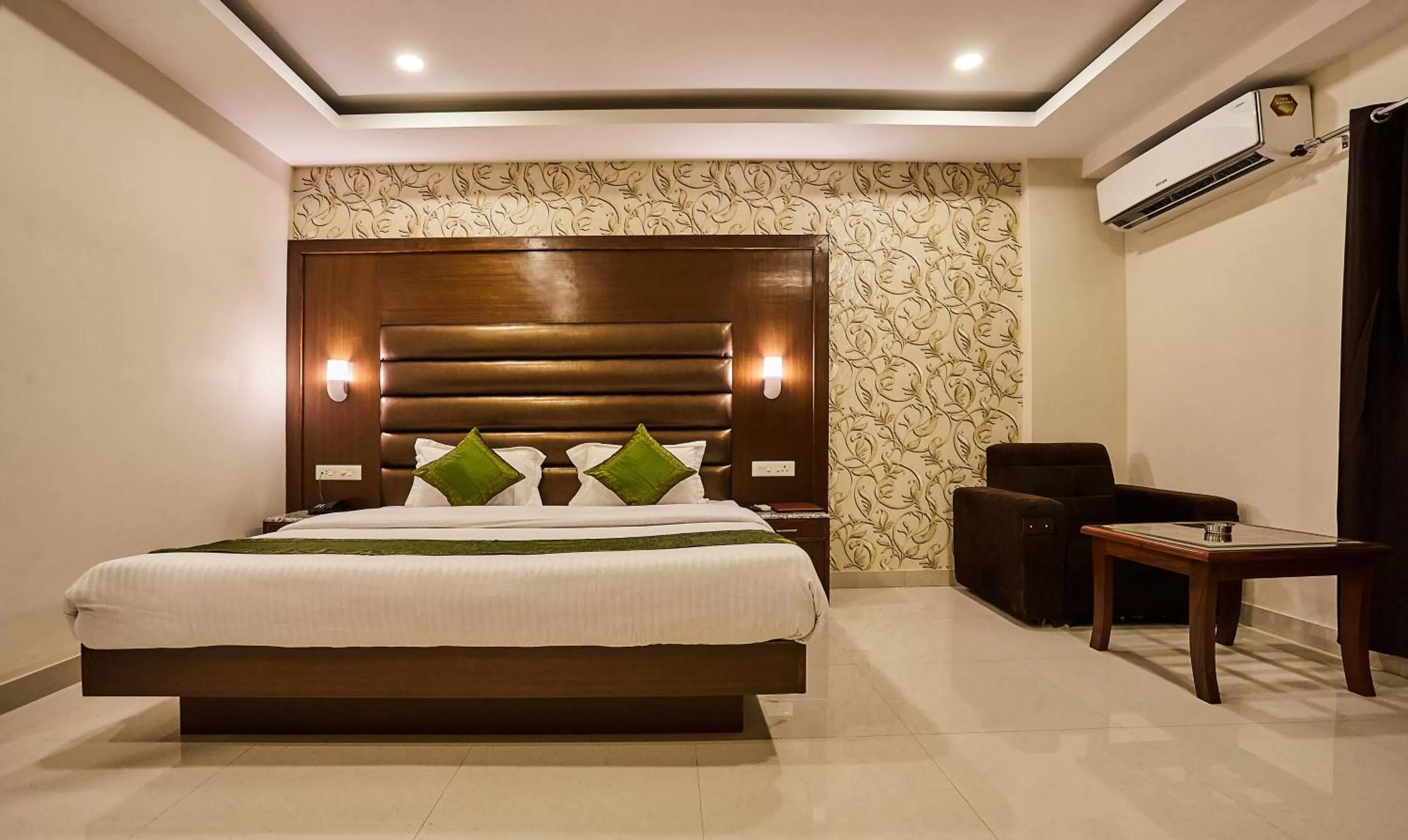 Bedroom, Bed in Treebo Grand Legacy Elite With Roof Top Cafe