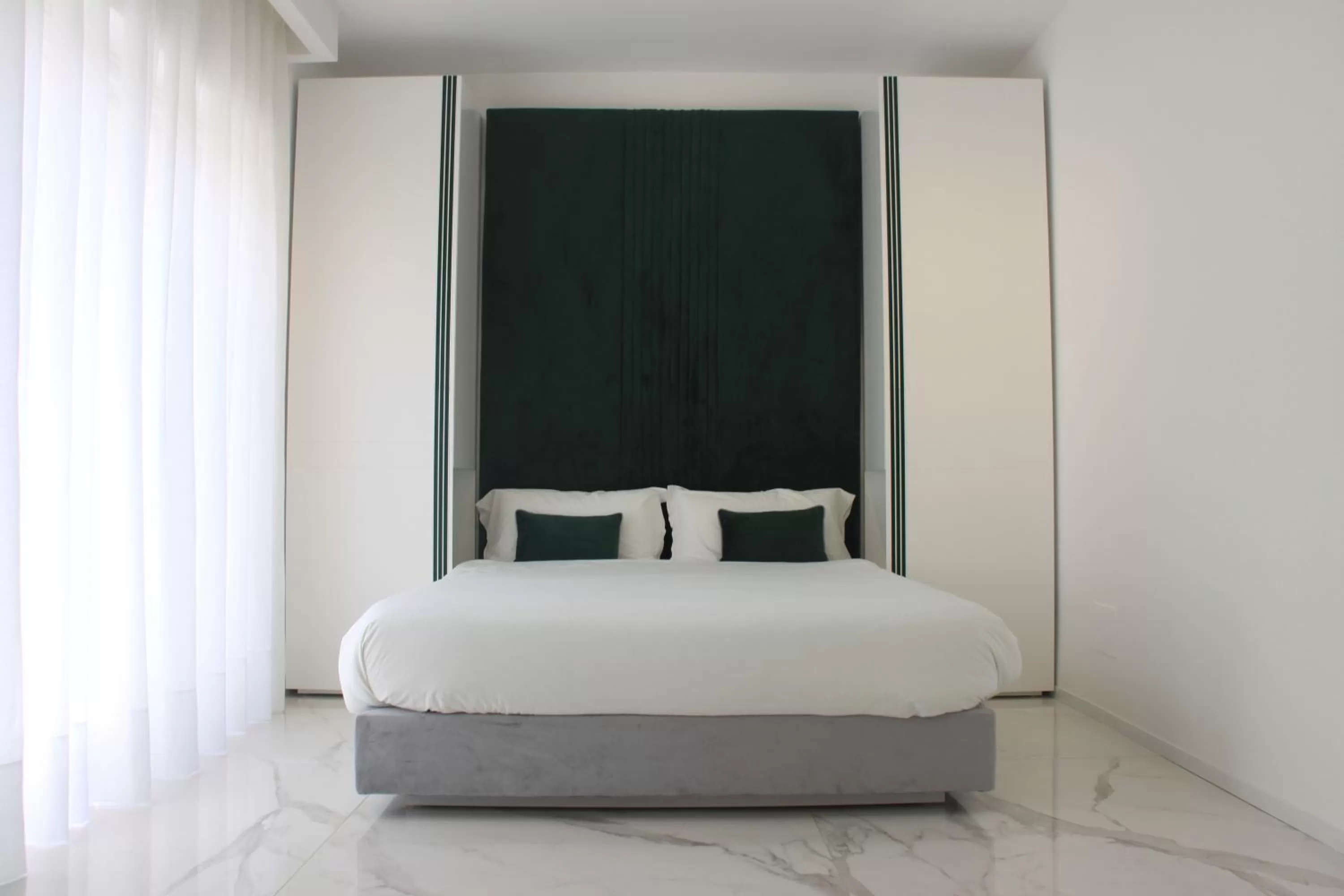 Bed in S'O Suites Tropea