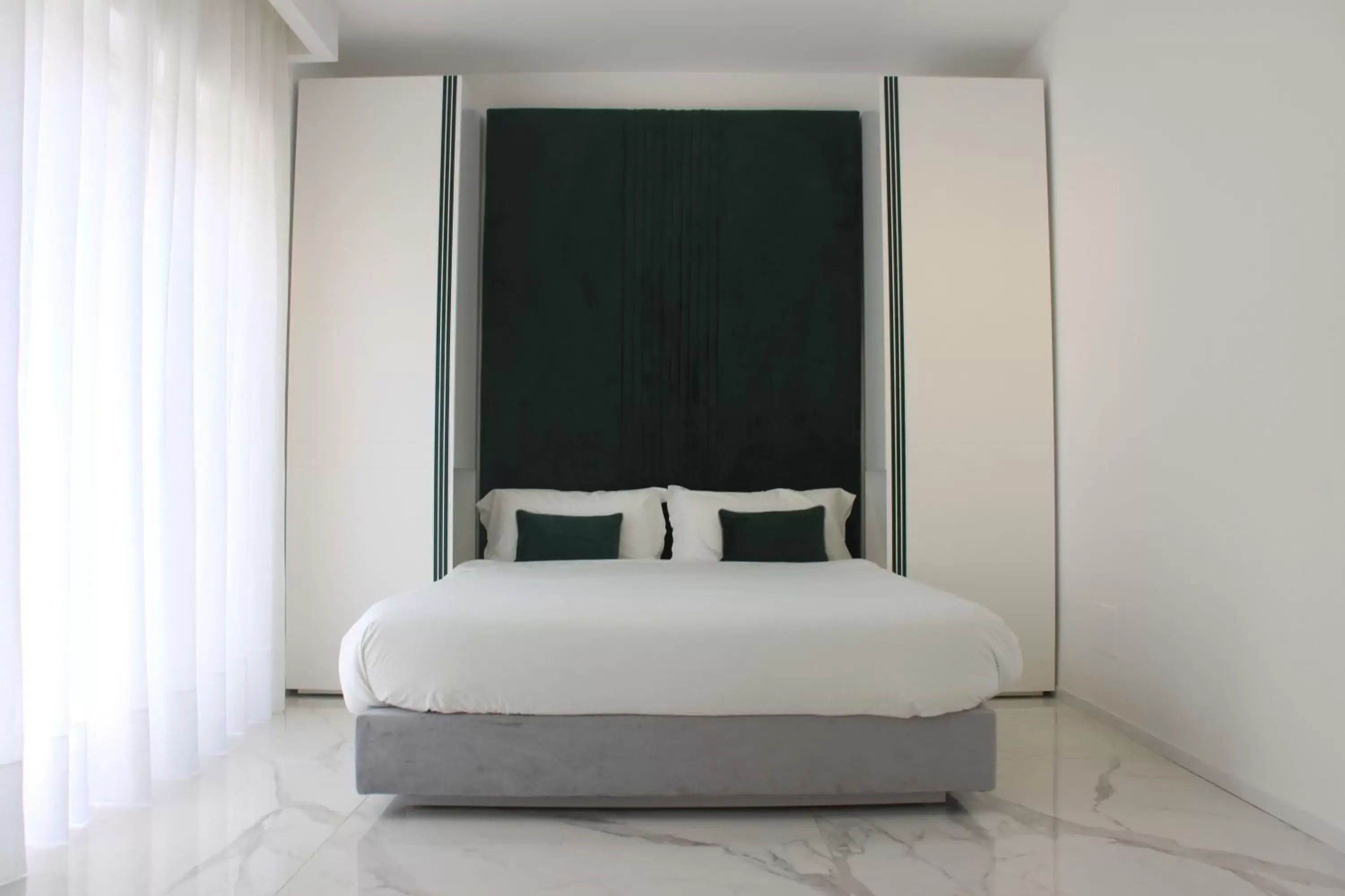 Bed in S'O Suites Tropea