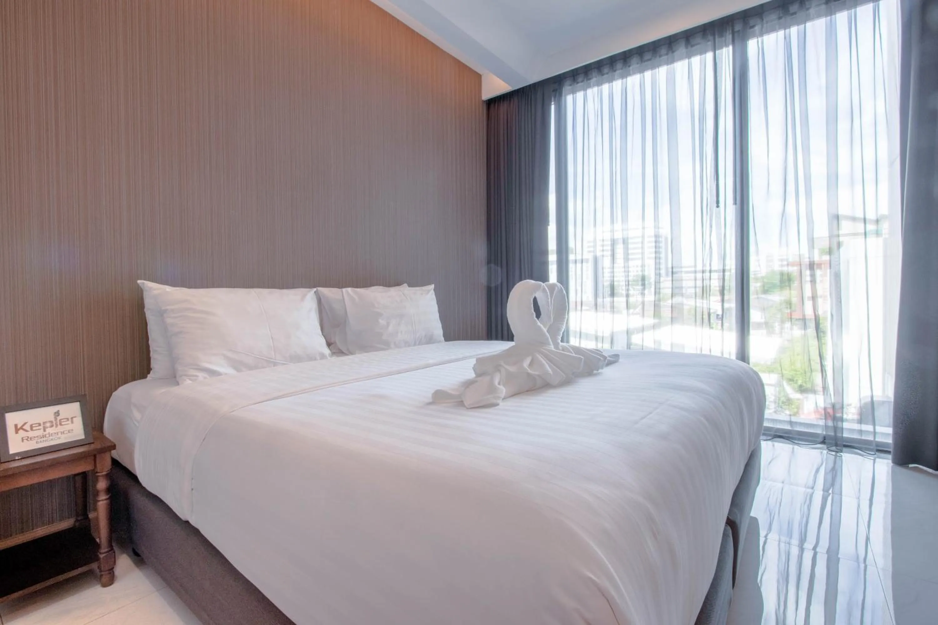 Bed in Kepler Residence Bangkok
