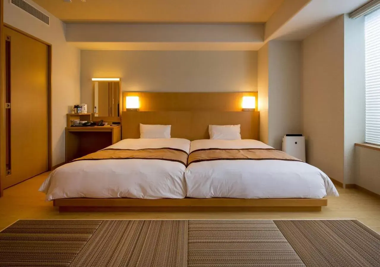 Photo of the whole room, Bed in Hotel Monterey Fukuoka