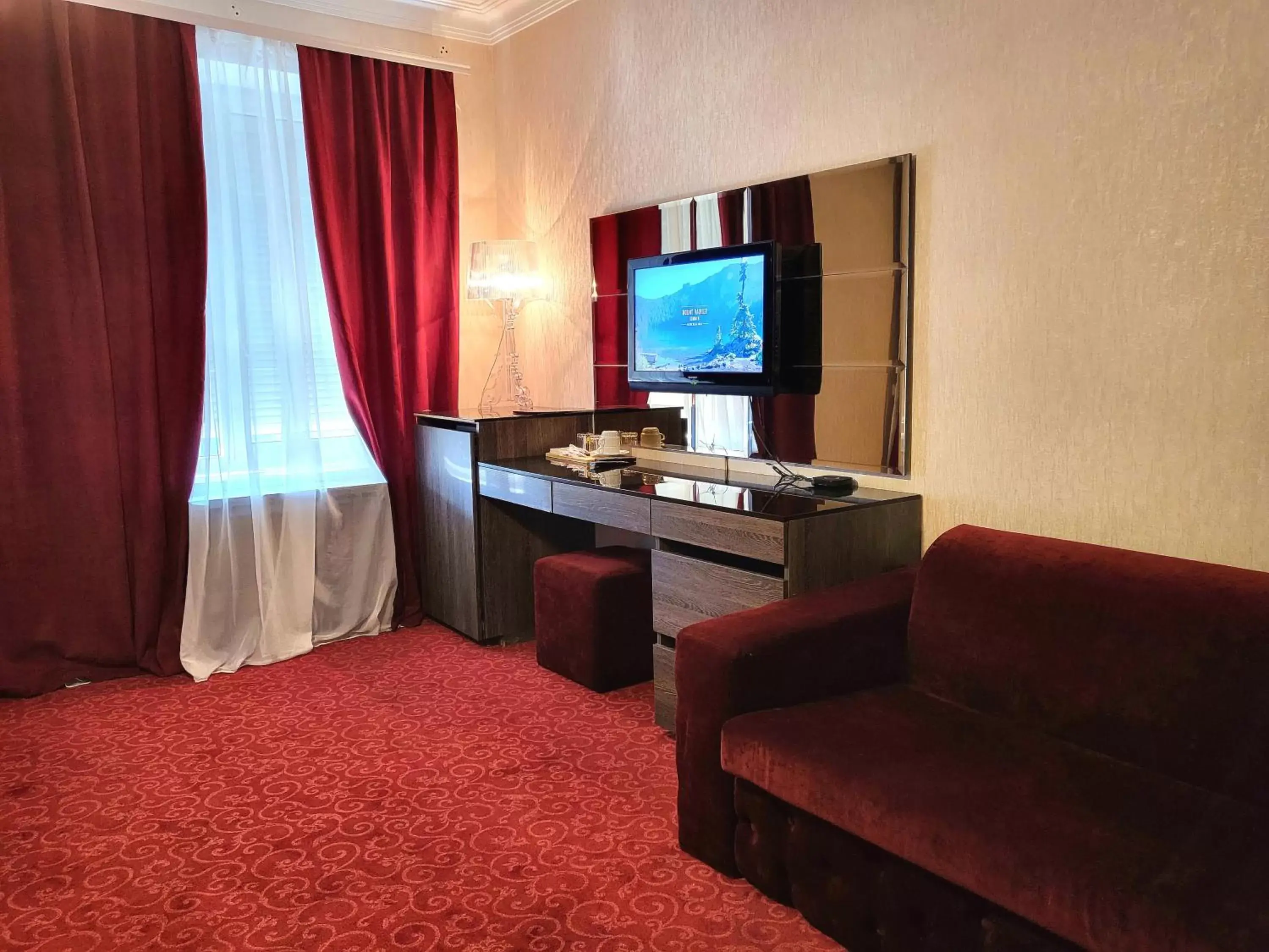 TV and multimedia, TV/Entertainment Center in Maxim Pasha Hotel