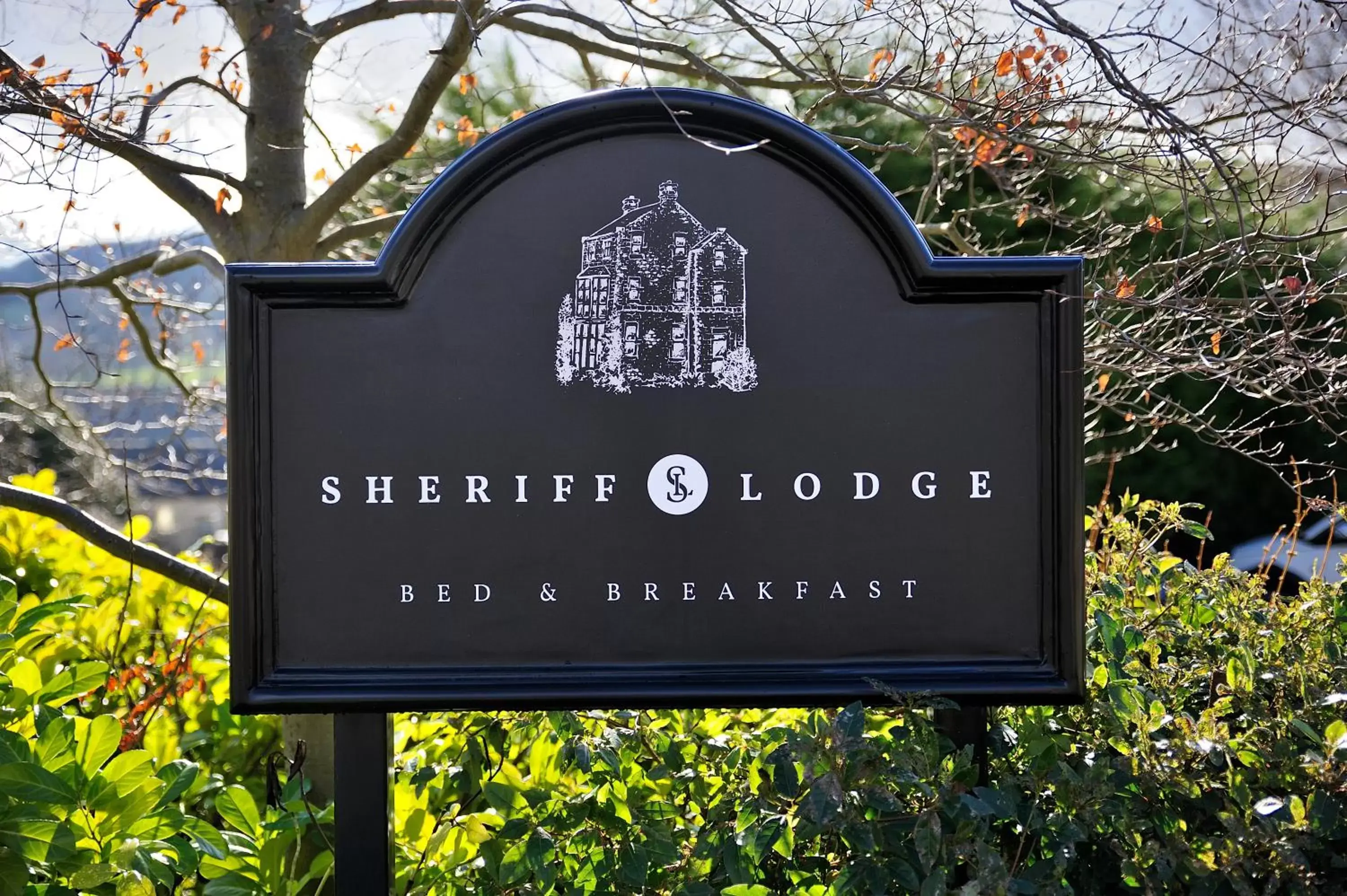 Property Logo/Sign in Sheriff Lodge