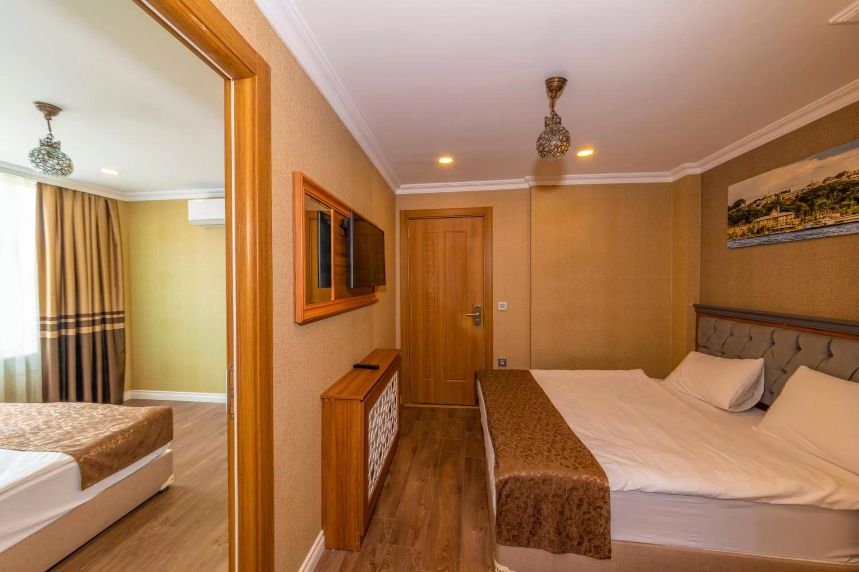 Bed in Golden Sand Hotel