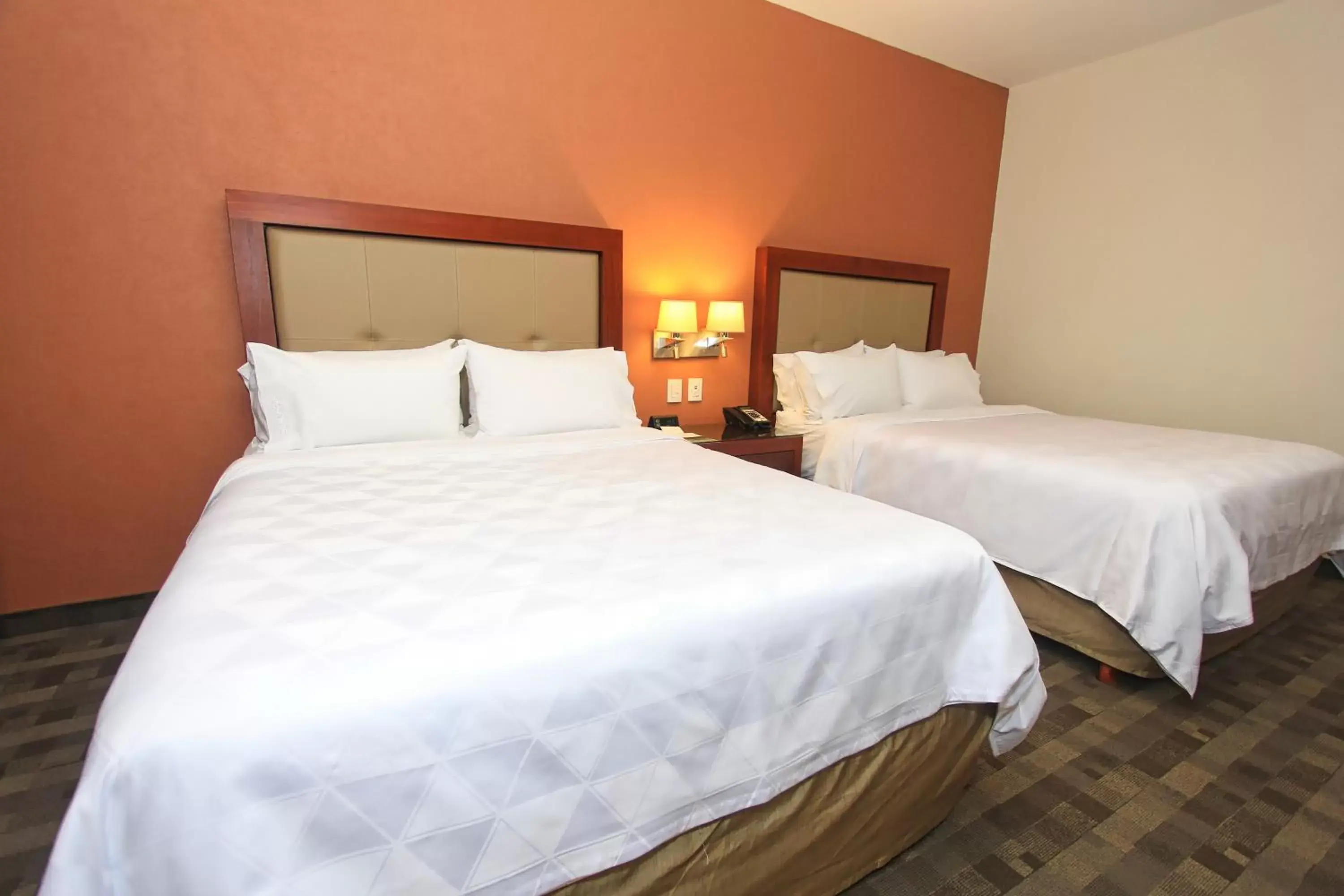 Bed in Holiday Inn & Suites Plaza Mayor, an IHG Hotel