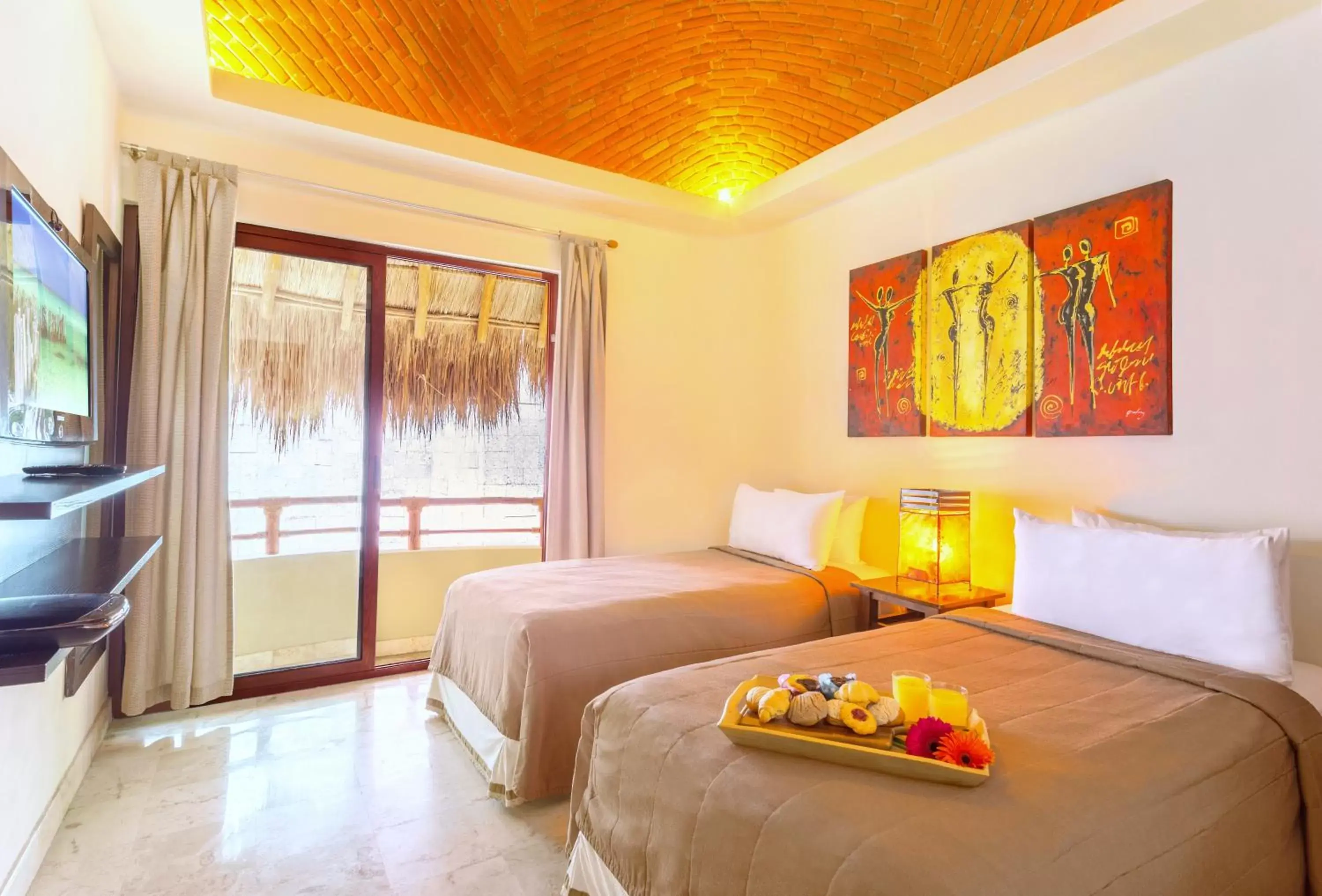 Bedroom in Maya Villa Condo Hotel and Beachclub