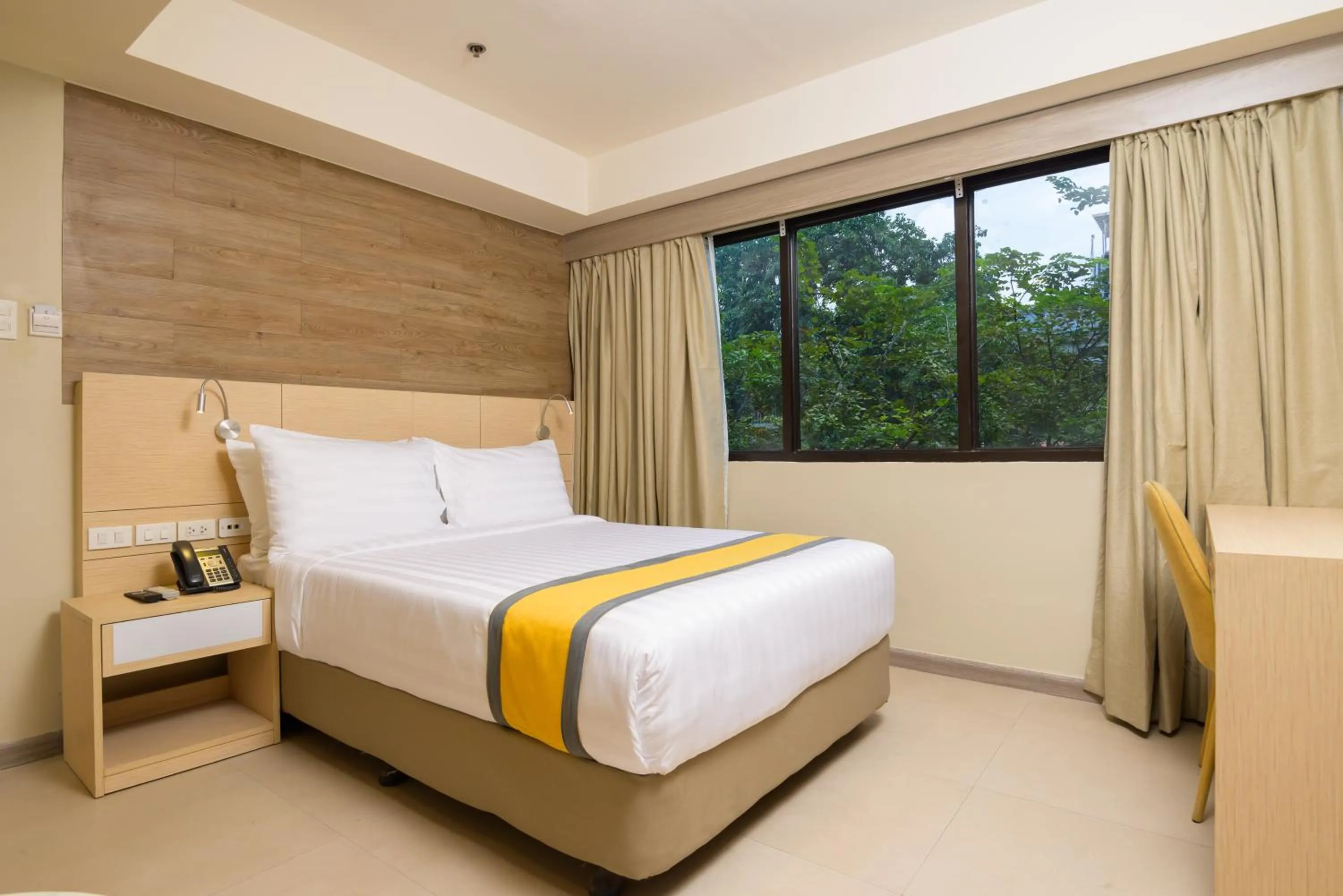Bed in SureStay Plus by Best Western Cebu City