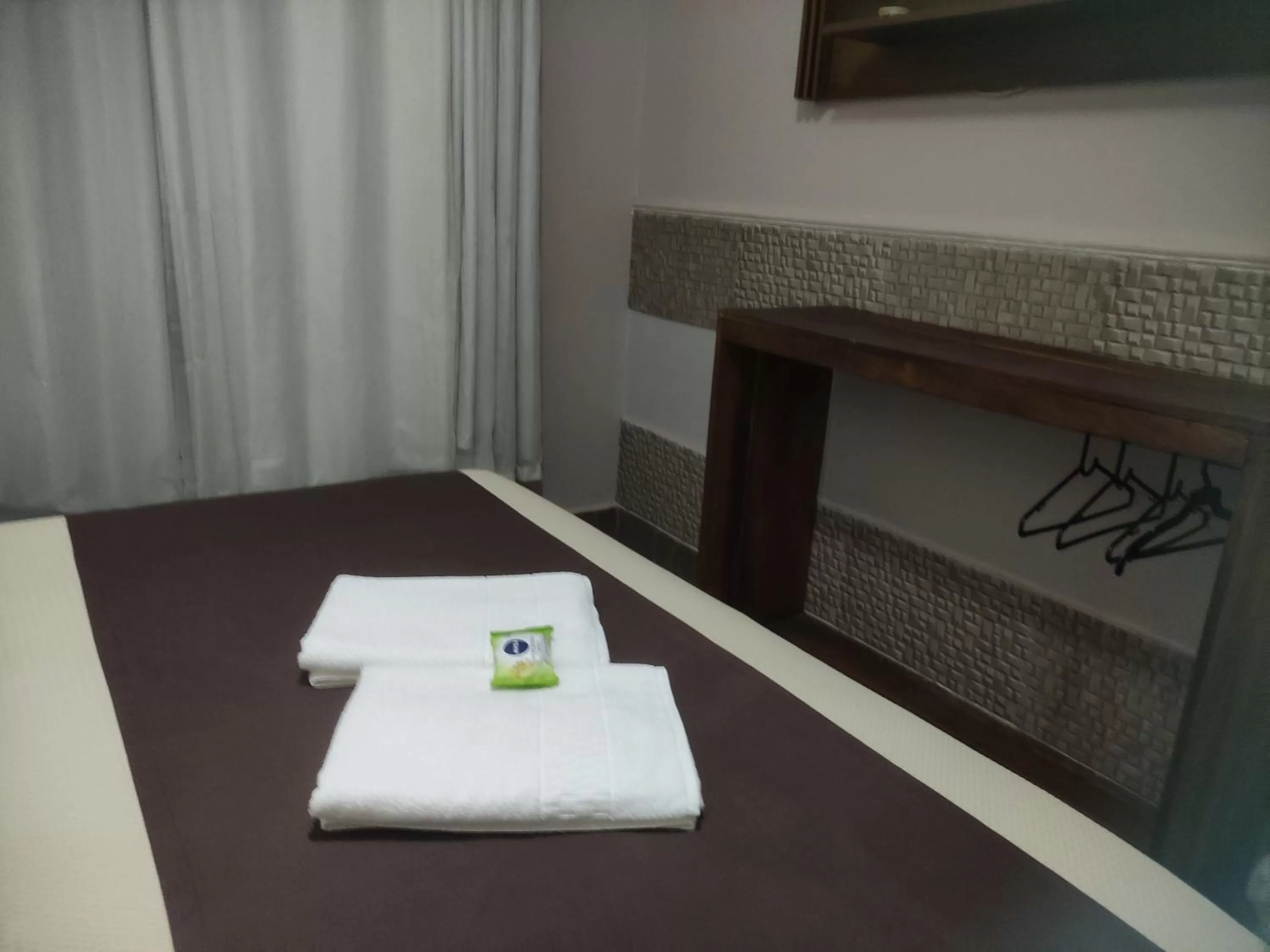 TV and multimedia in Pousada da Gi Suítes e Turismo