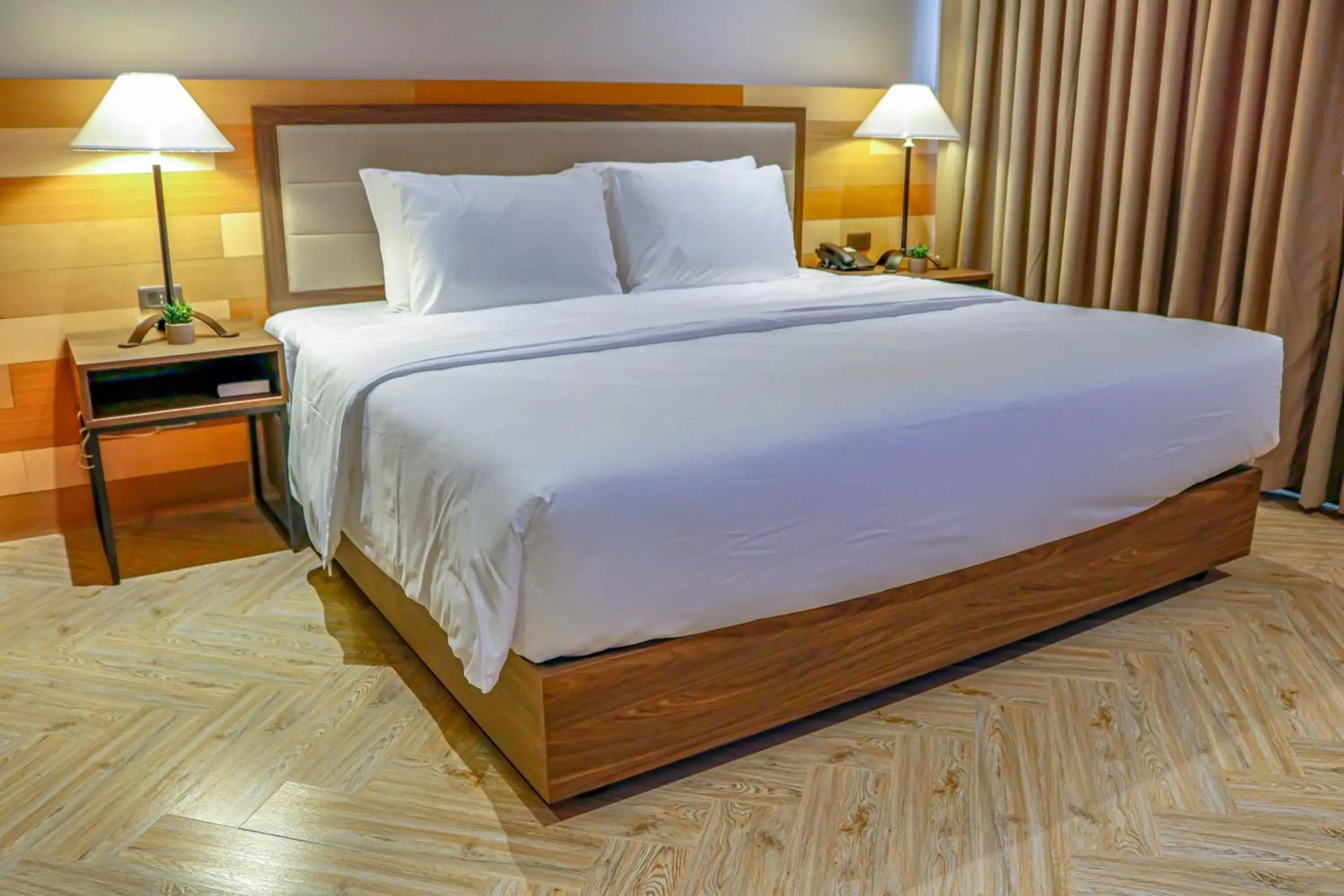 Bed in Acacia Hotel Bacolod