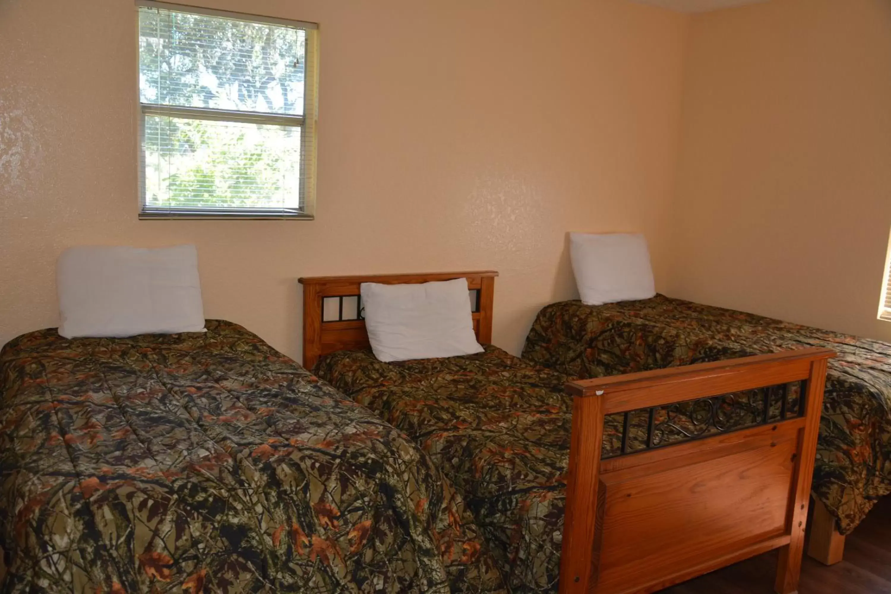 Bed in Camp Mack Lodge, Marina & RV Resort Bed in Camp Mack Lodge, Marina & RV Resort