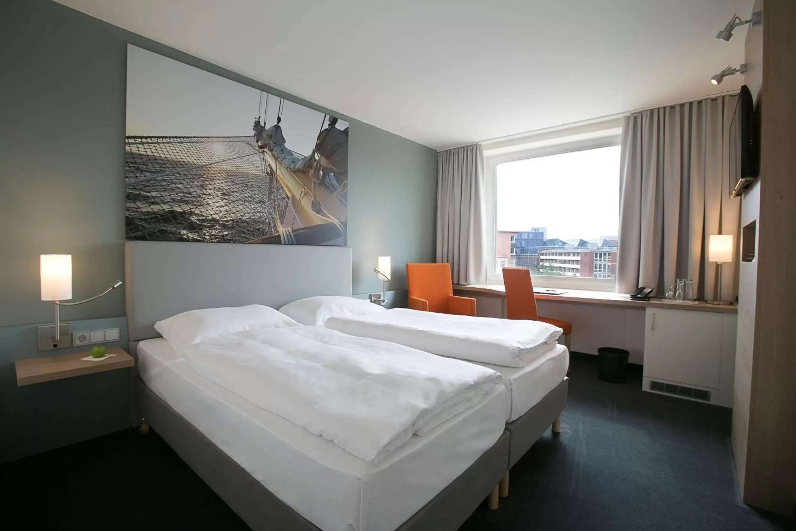 Photo of the whole room, Bed in Nordsee Hotel City