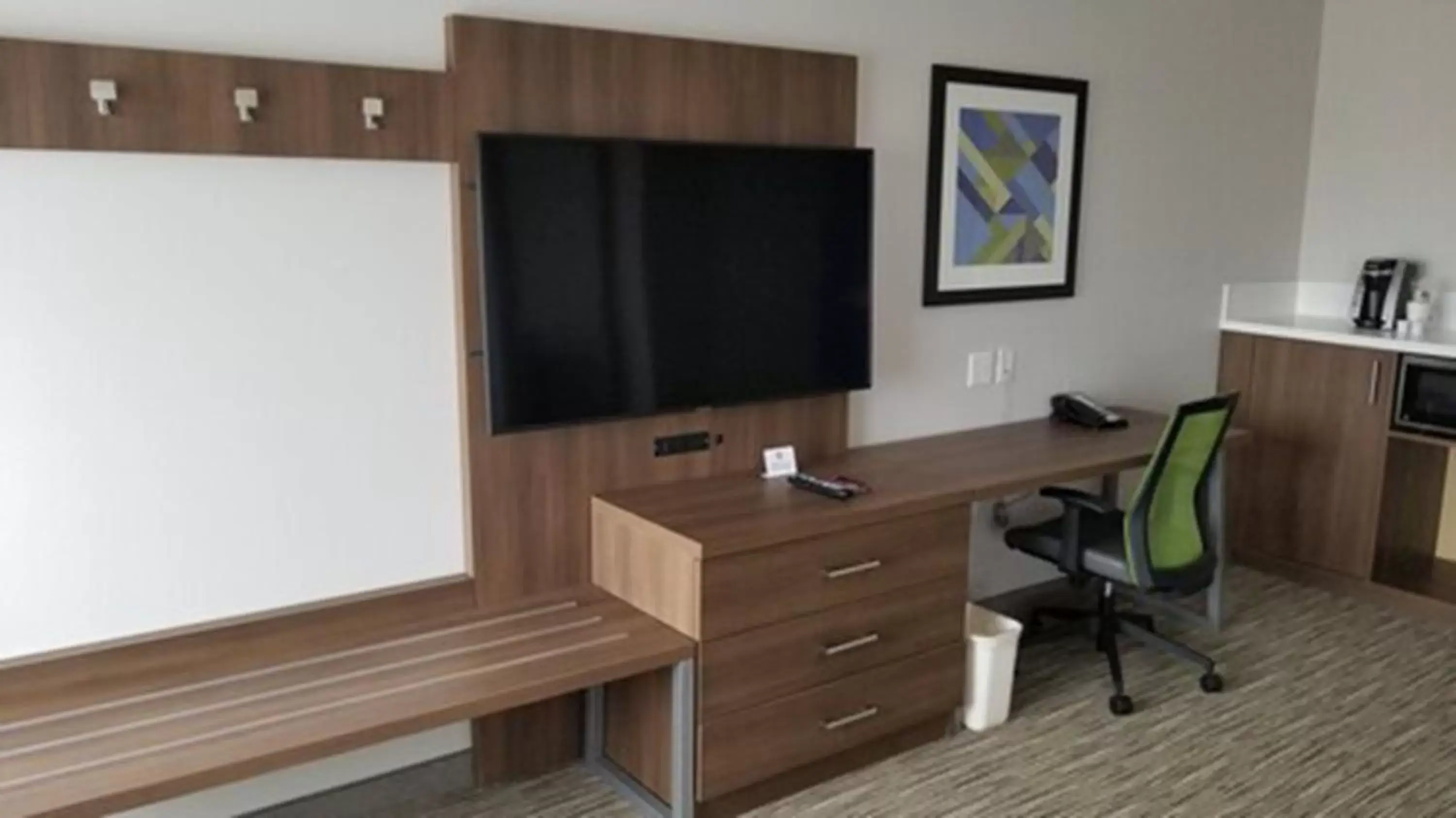 TV and multimedia, TV/Entertainment Center in Holiday Inn Express & Suites - Lake Forest, an IHG Hotel