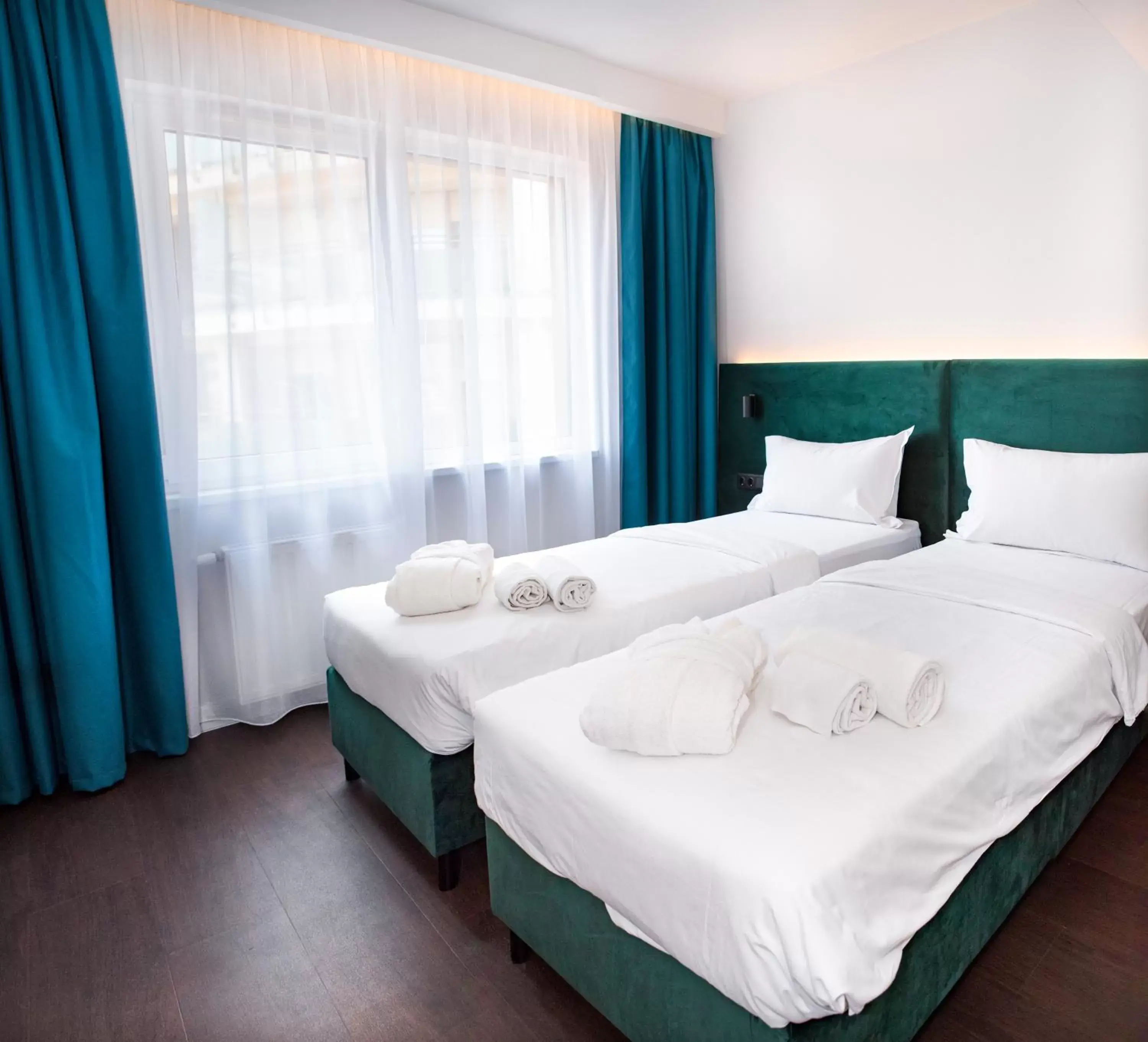 Bedroom, Bed in Escala Hotel & Suites