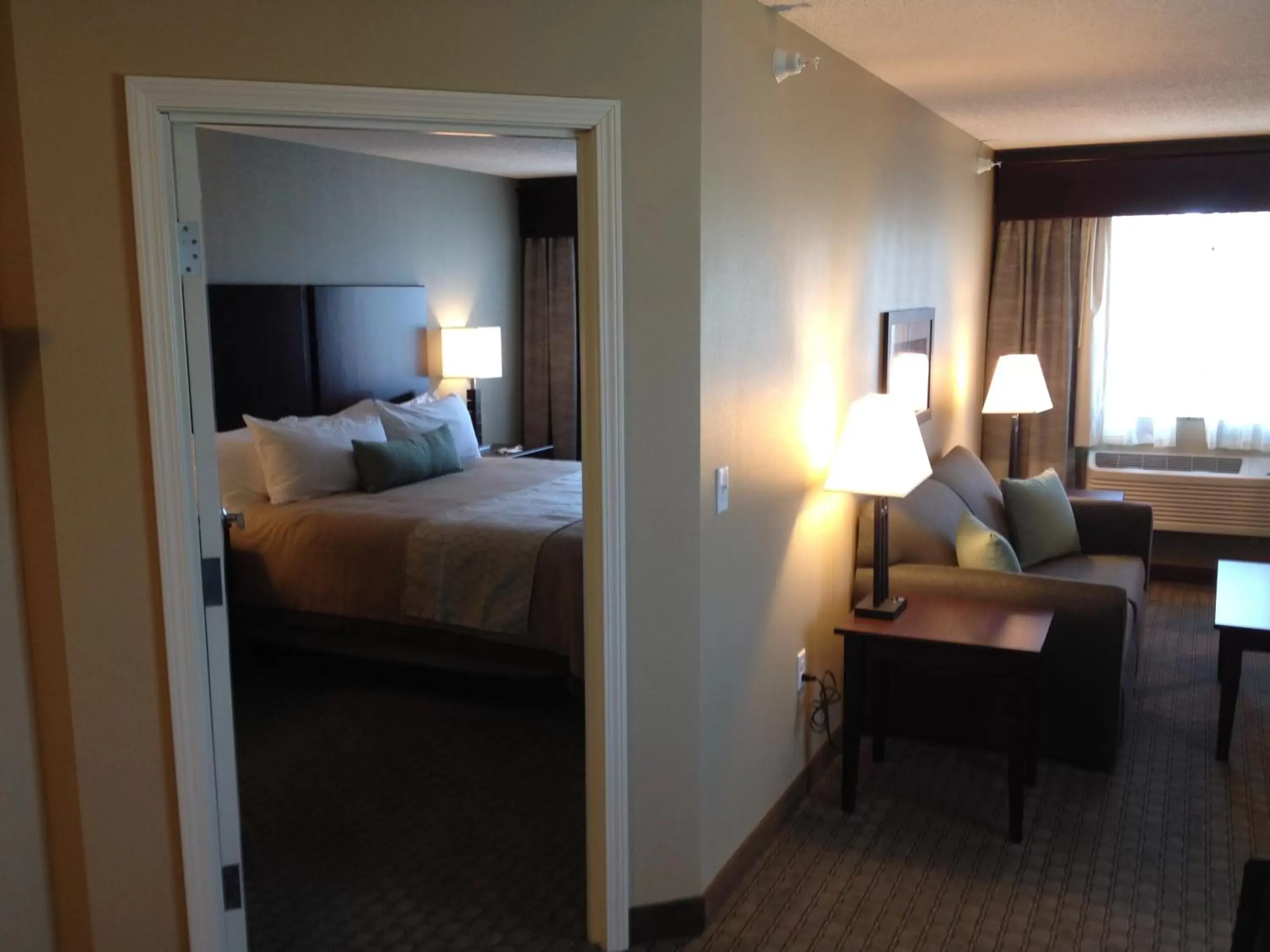 Bed in GrandStay Hotel & Suites - Glenwood