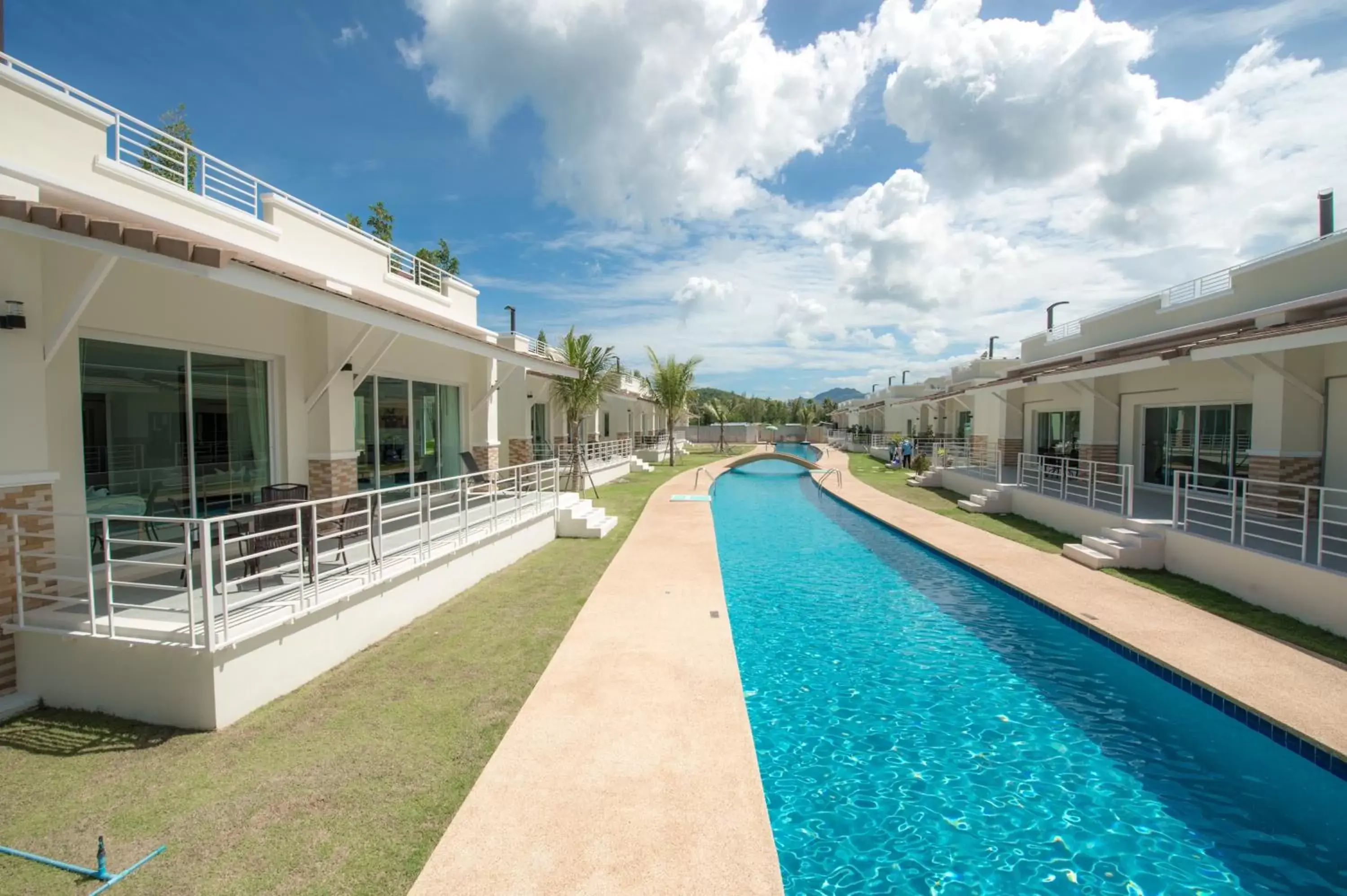 Swimming pool, Property Building in Oriental Beach Pearl Resort