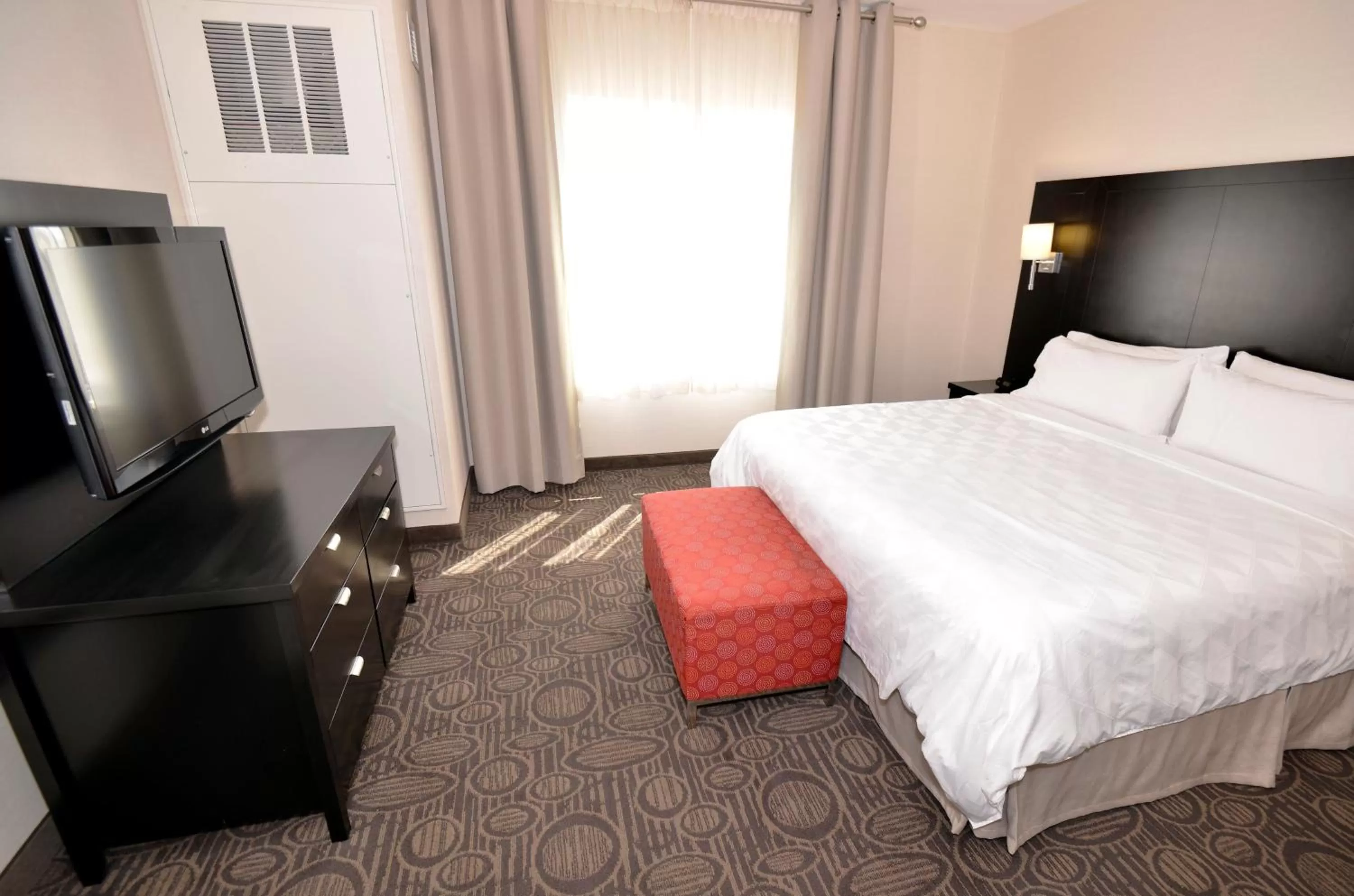 Bedroom, Bed in Holiday Inn Hotel & Suites Red Deer by IHG