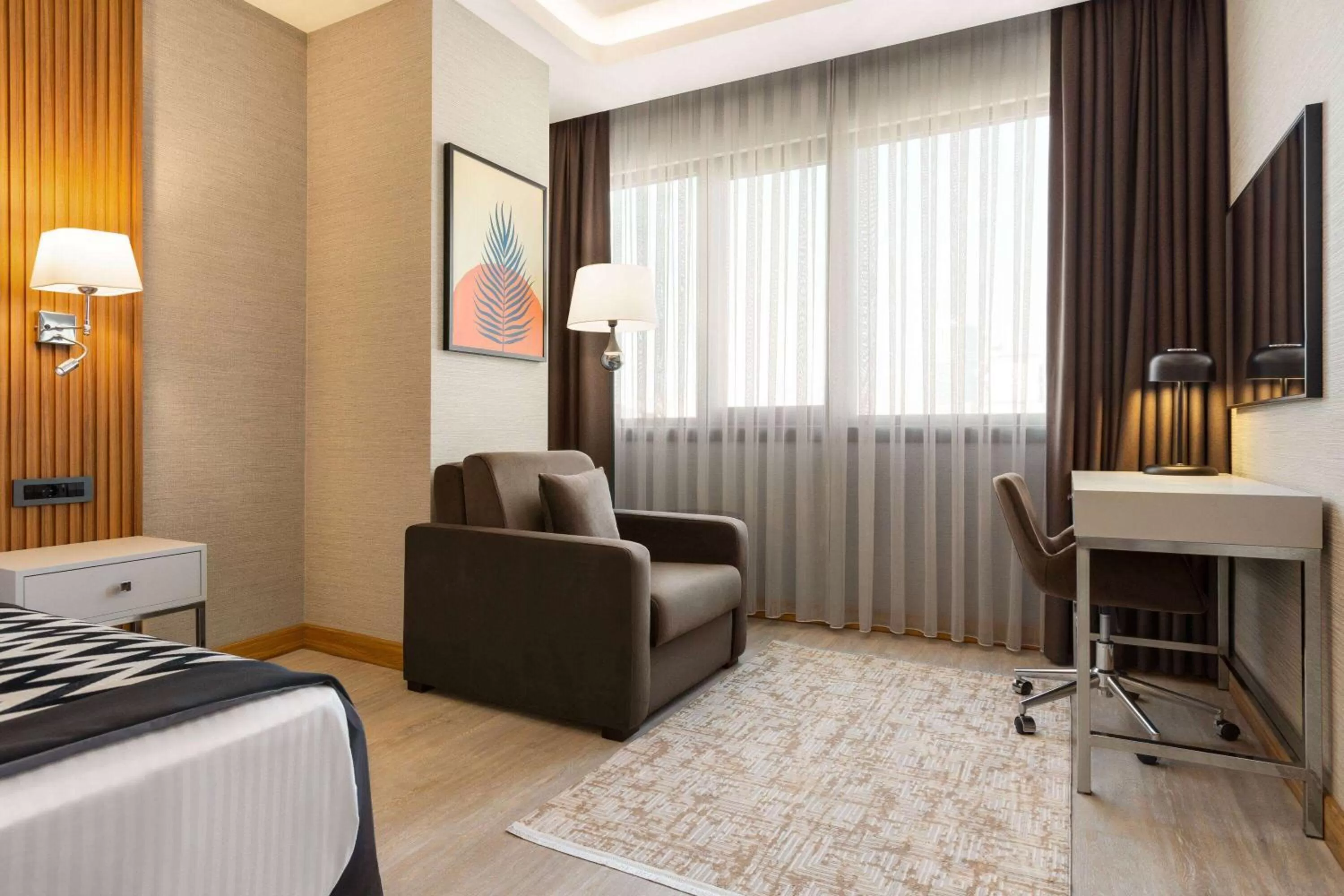 Photo of the whole room in Ramada Encore by Wyndham Istanbul Sisli