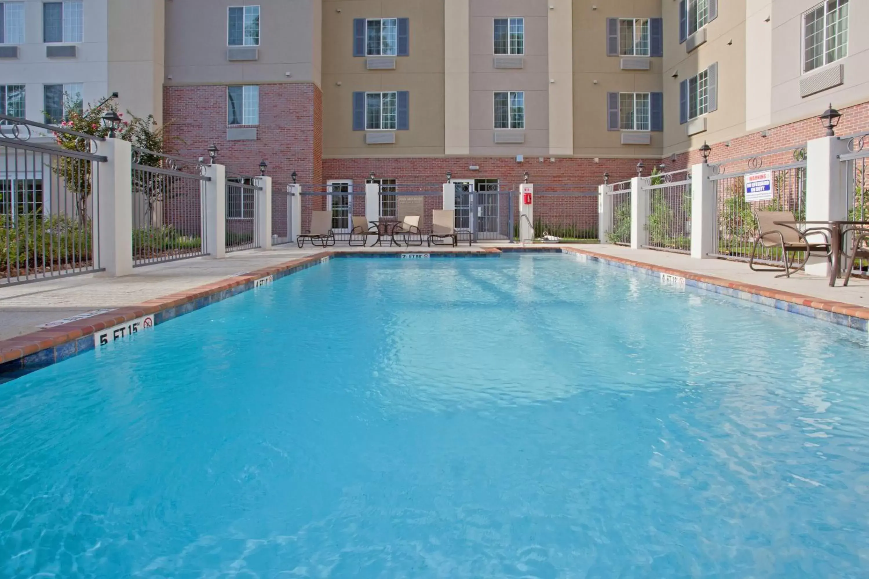 Swimming Pool in Candlewood Suites Houston The Woodlands, an IHG Hotel