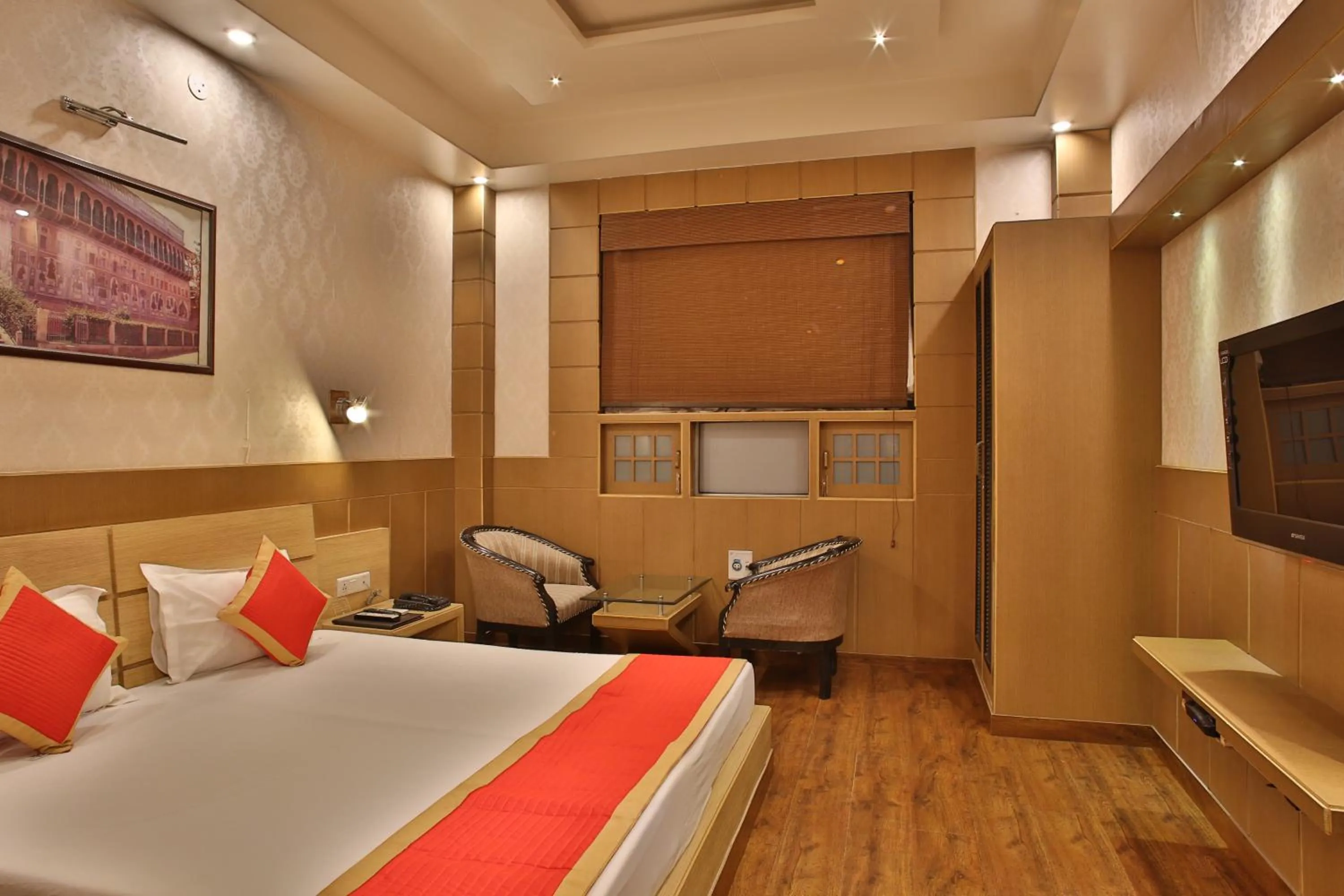Communal lounge/ TV room, Bed in Hotel The Grand Chandiram