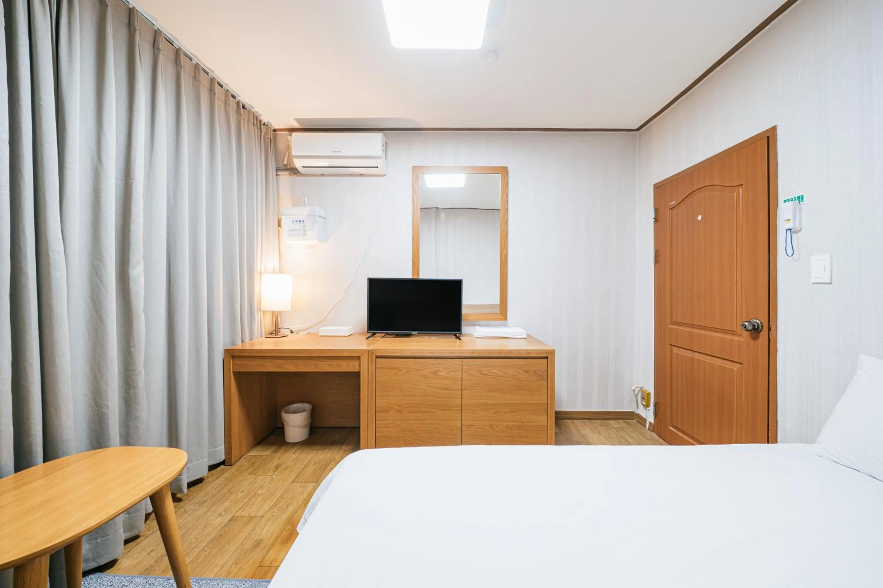 Bed in Jeju Miracle Hotel