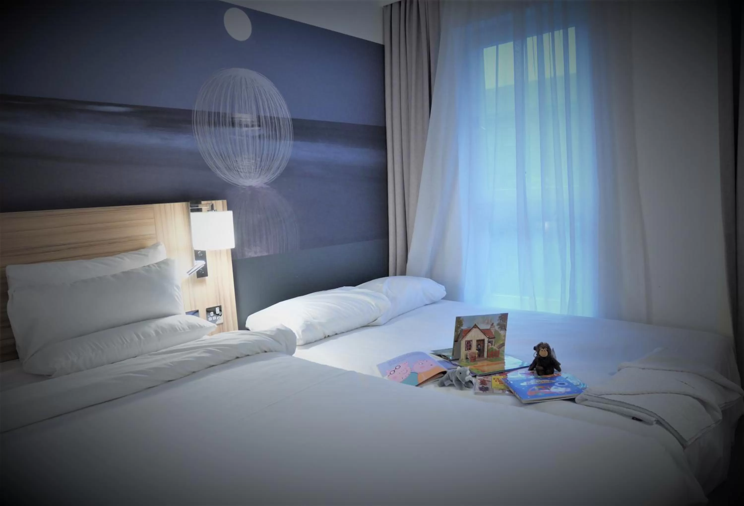 Bed in Novotel London Stansted Airport