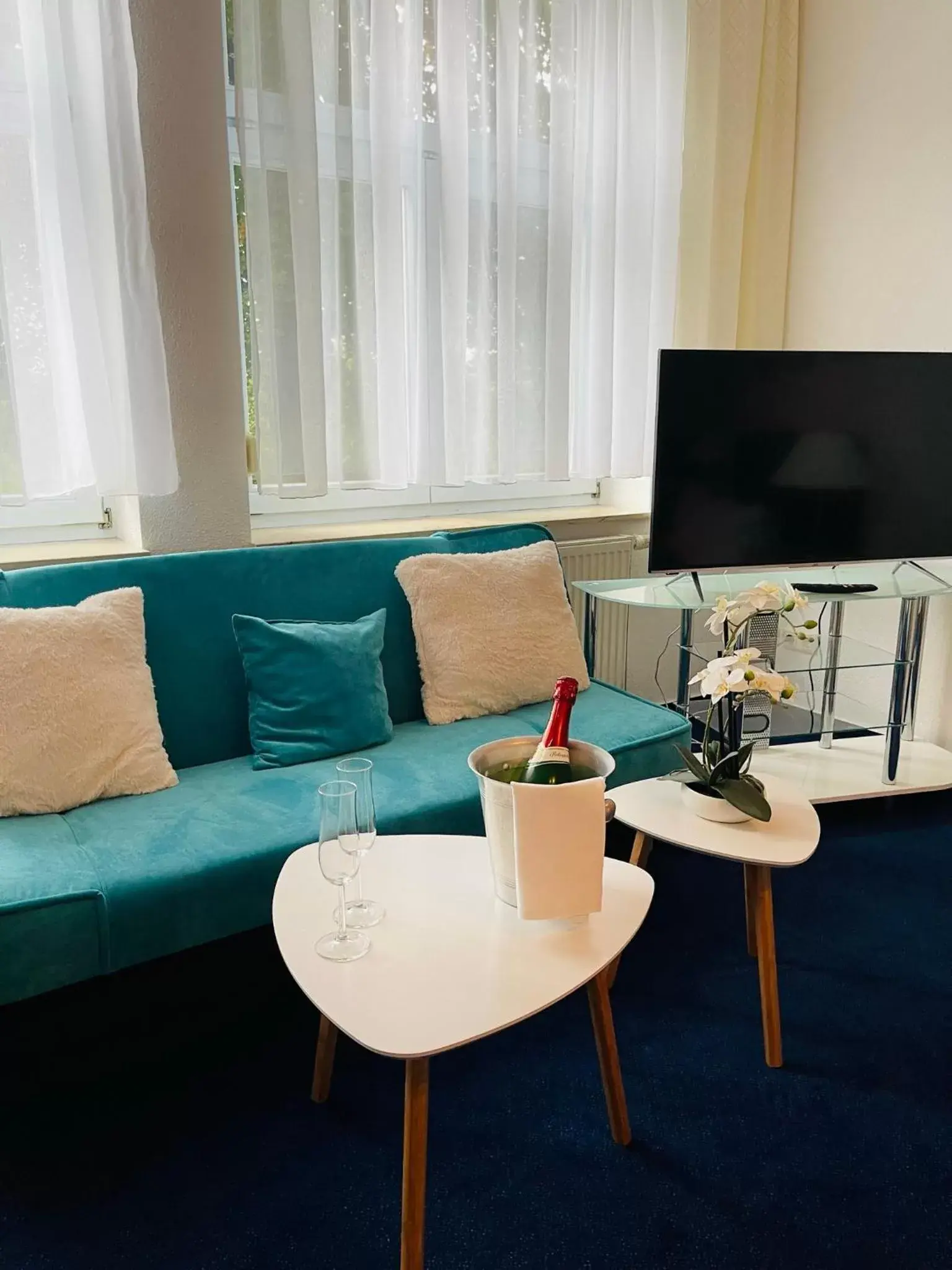 Living room in Parkhotel Waldschlösschen Living room in Parkhotel Waldschlösschen