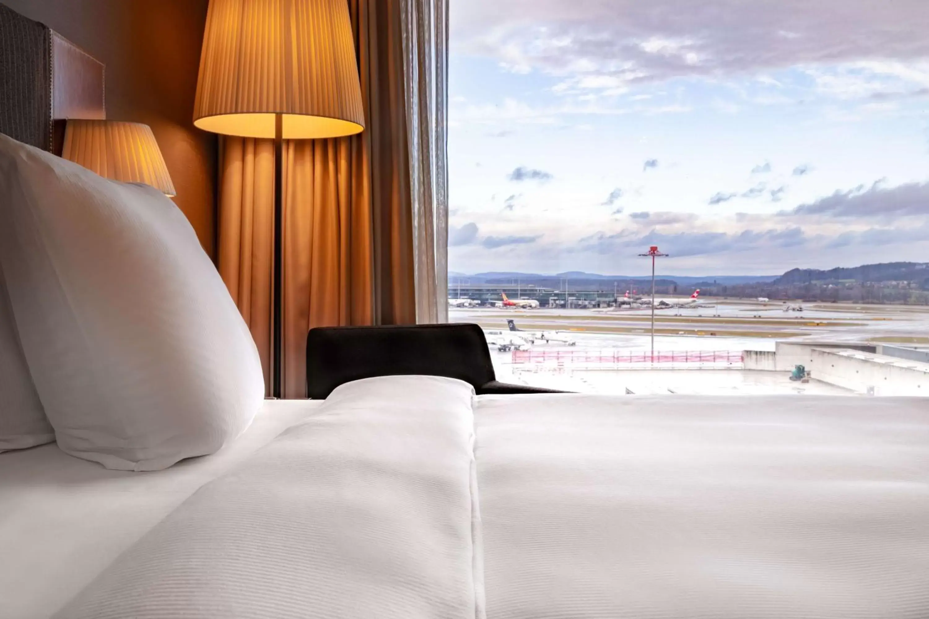 View (from property/room), Bed in Radisson Blu Hotel Zurich Airport