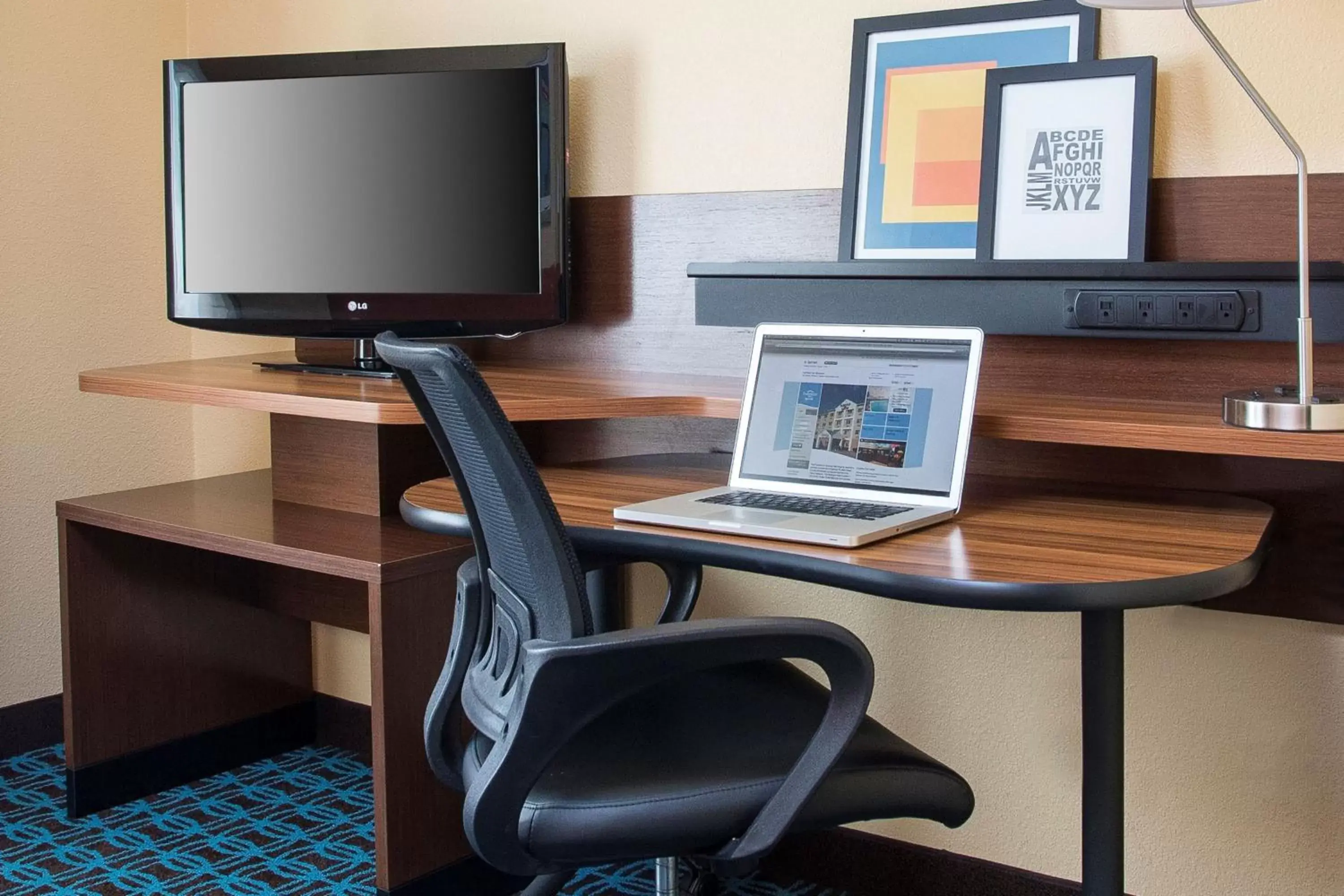 Photo of the whole room, TV/Entertainment Center in Fairfield Inn & Suites by Marriott Branson