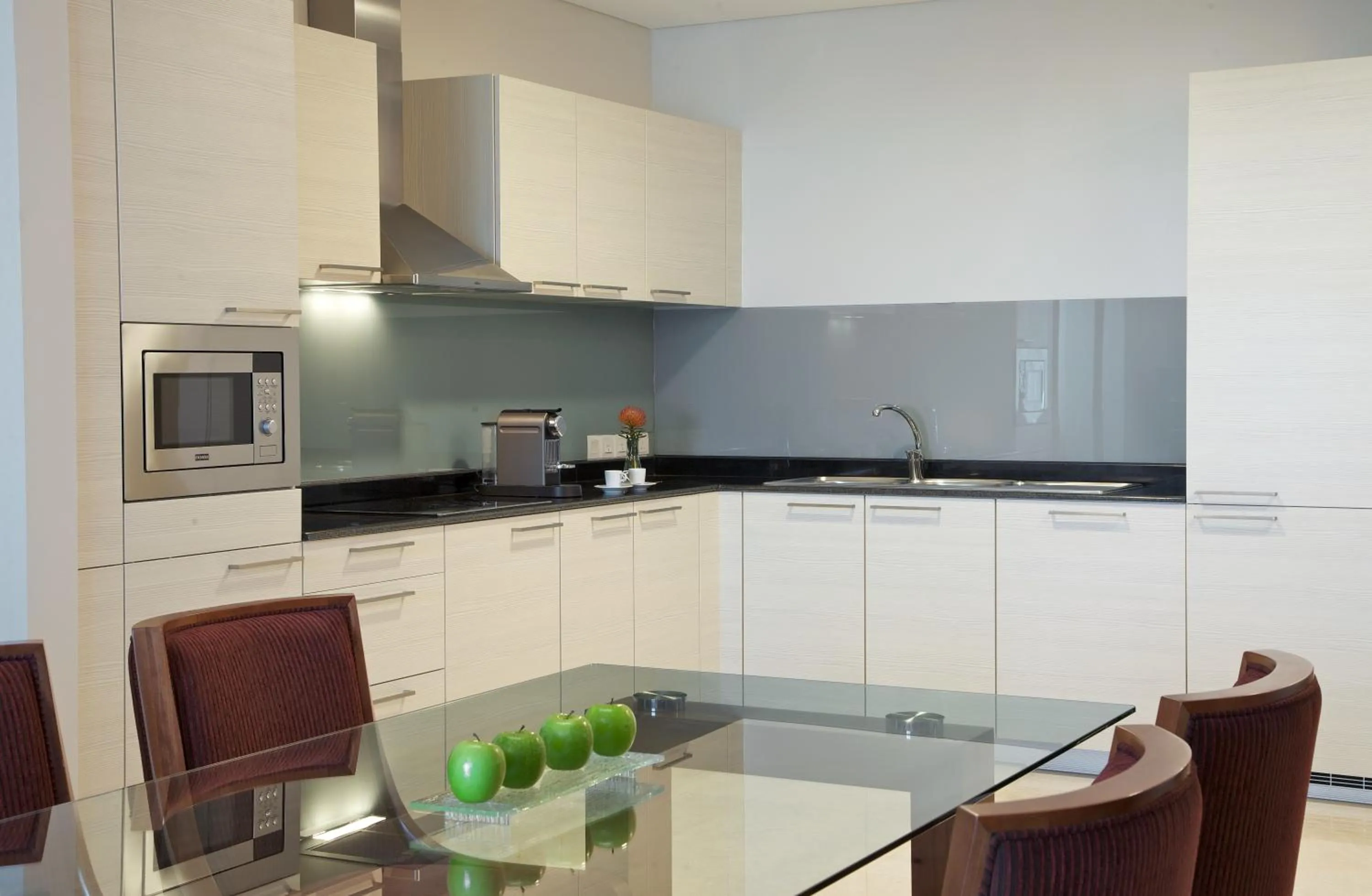 Kitchen or kitchenette in Millennium Executive Apartments Muscat