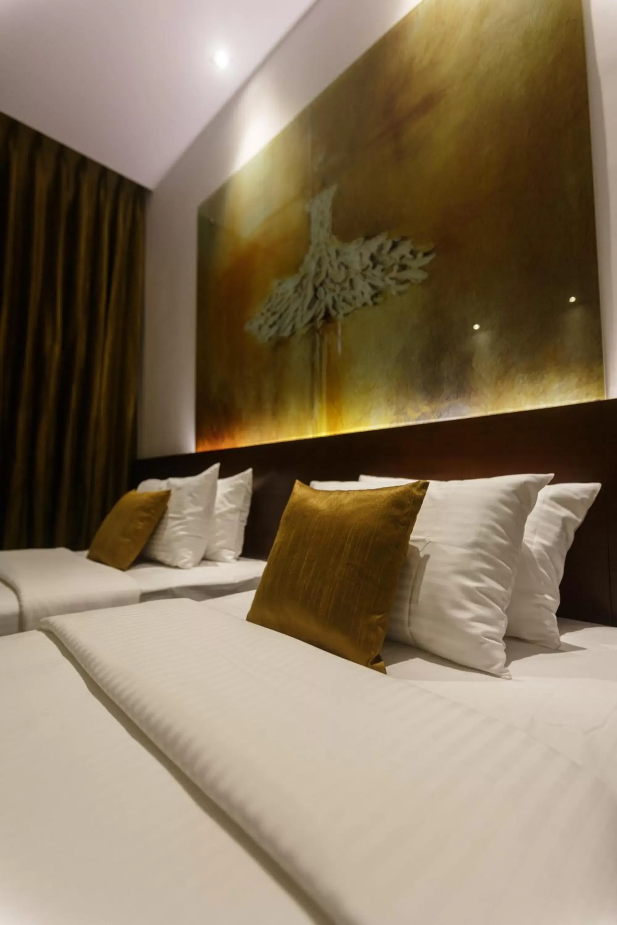 Bed in Renuka City Hotel