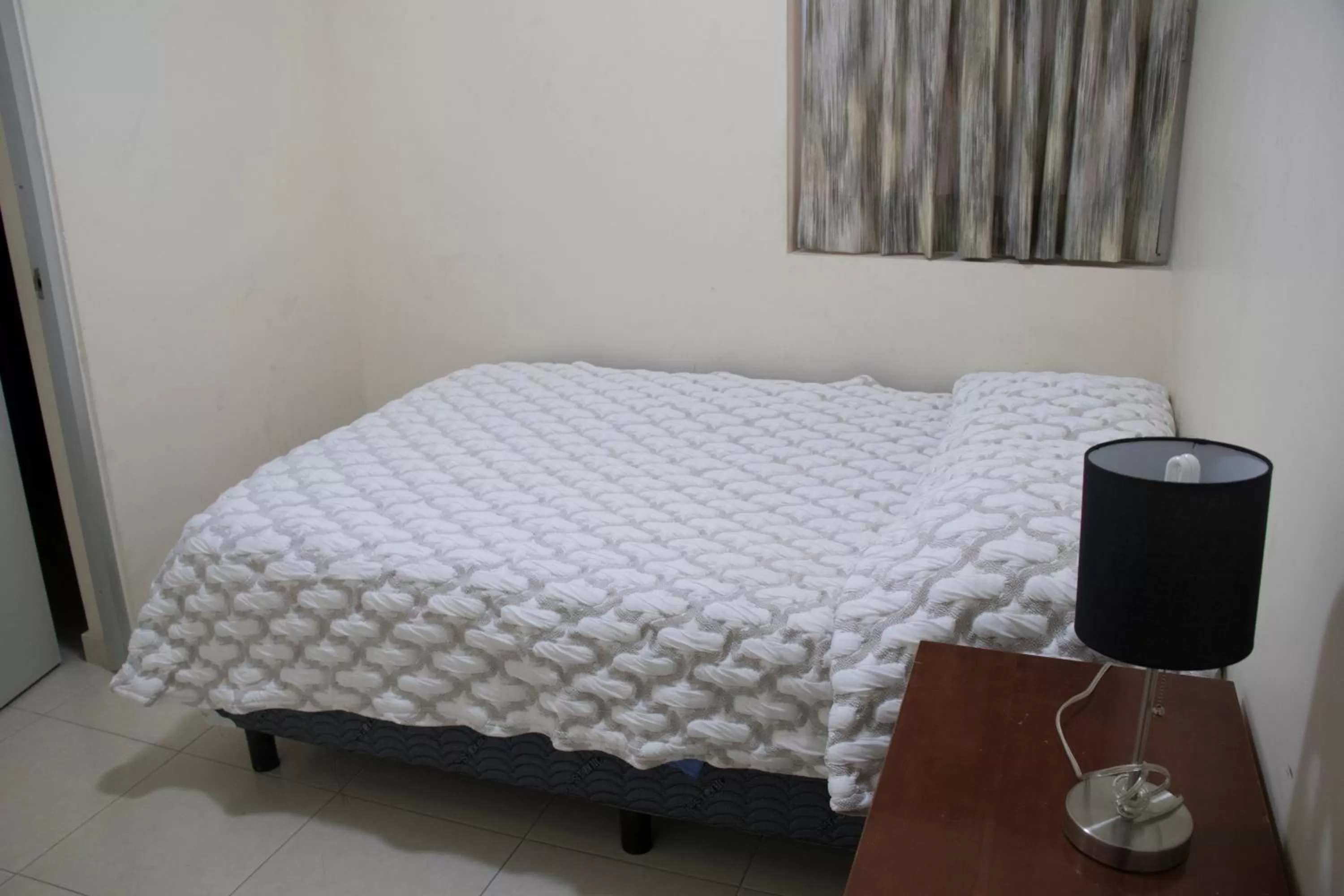 Bed in Hotel Nápoles