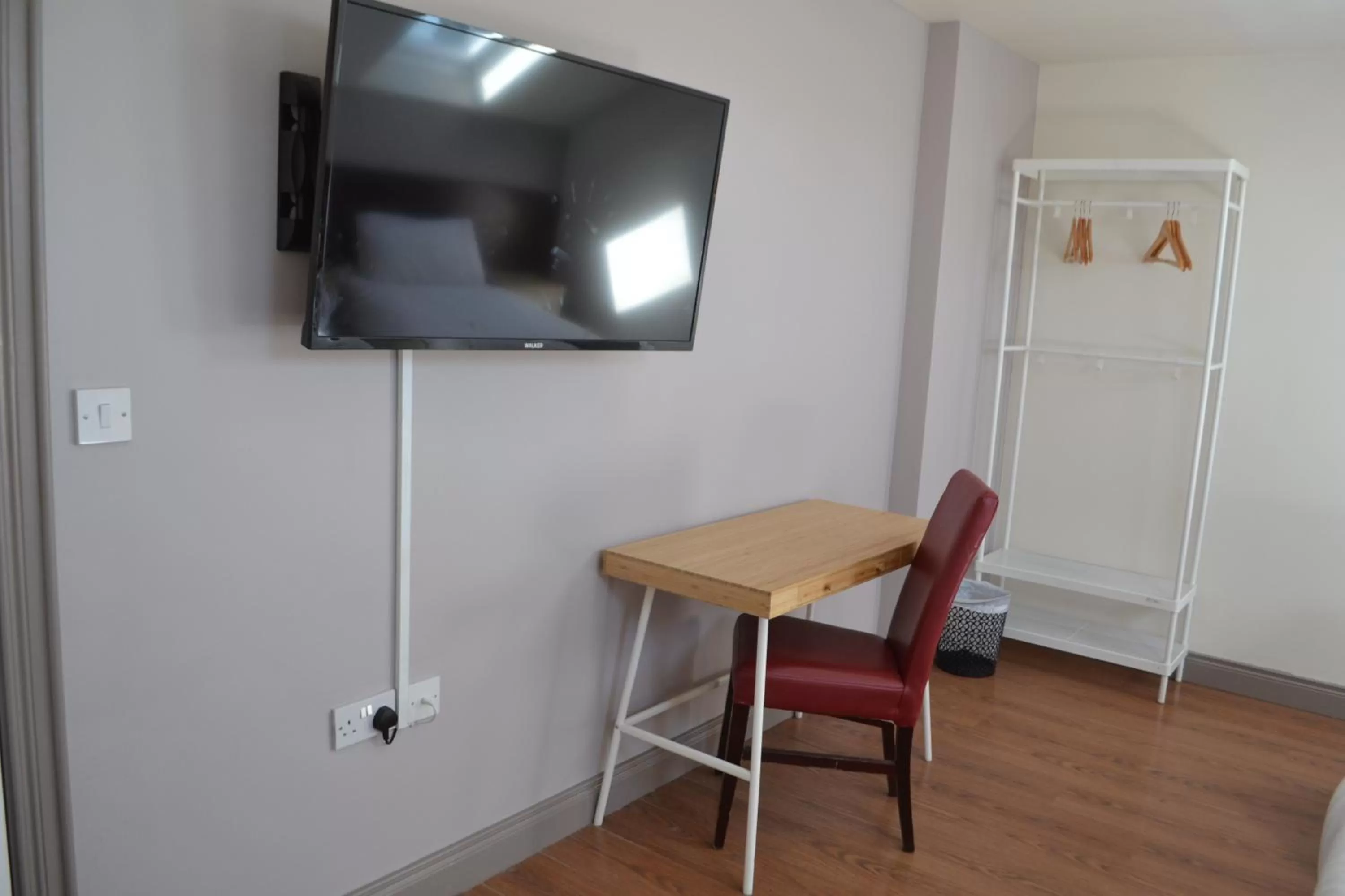 Bedroom in Walsh's Hotel and Apartments