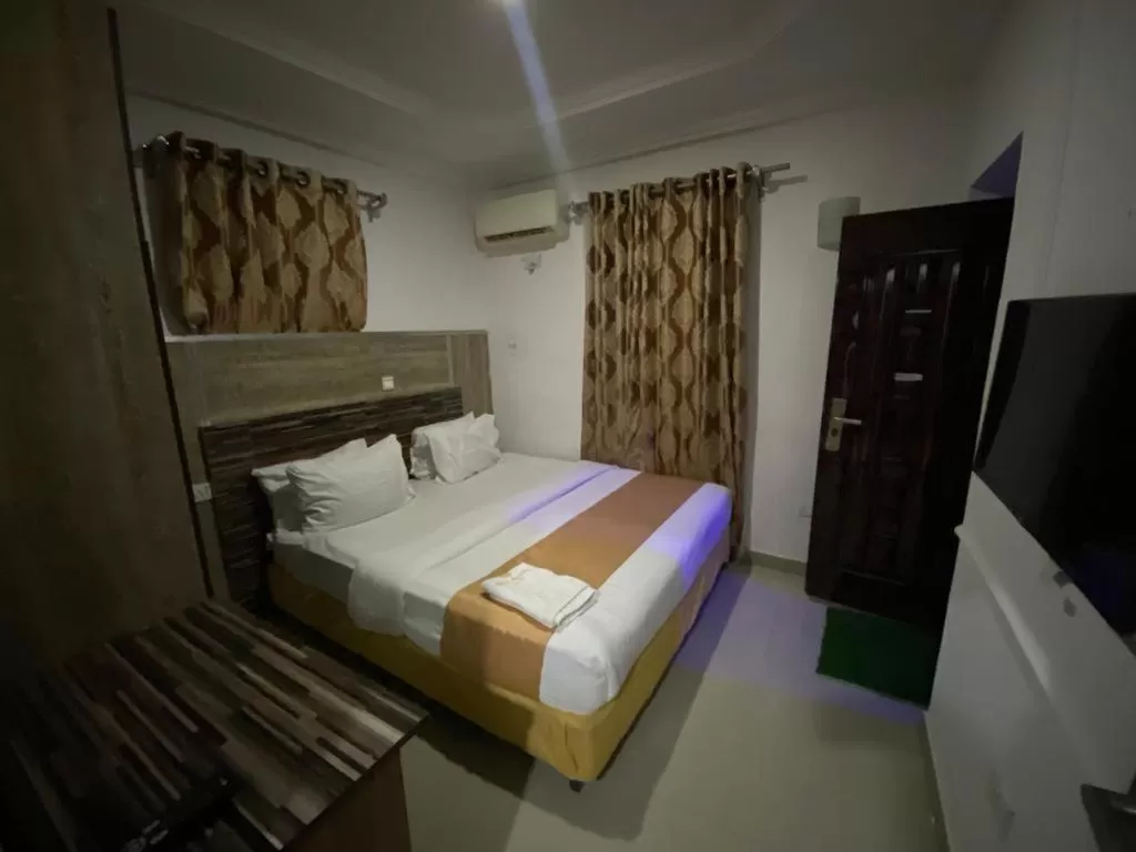 Bed in Palazzo Apartments