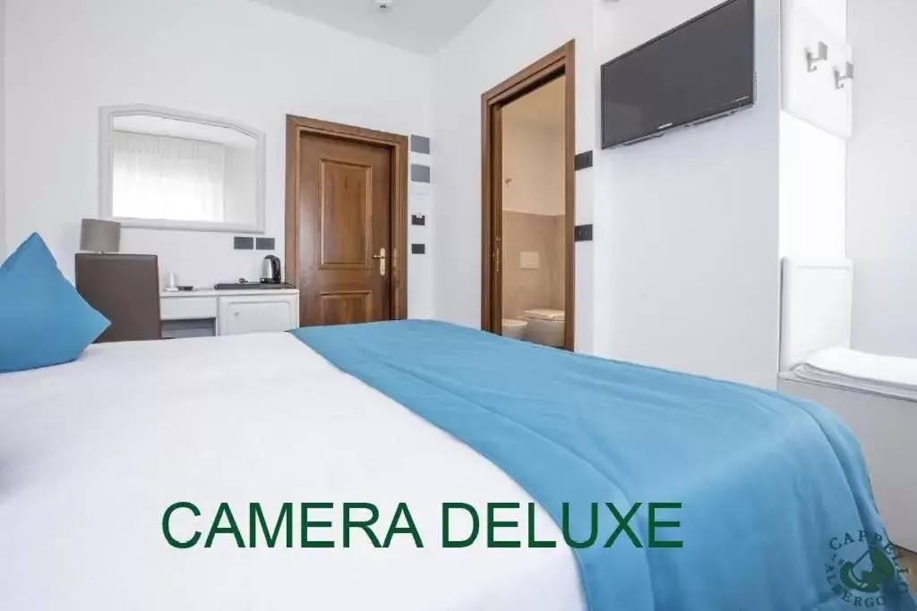 Bed in Albergo Cappello e Cadore