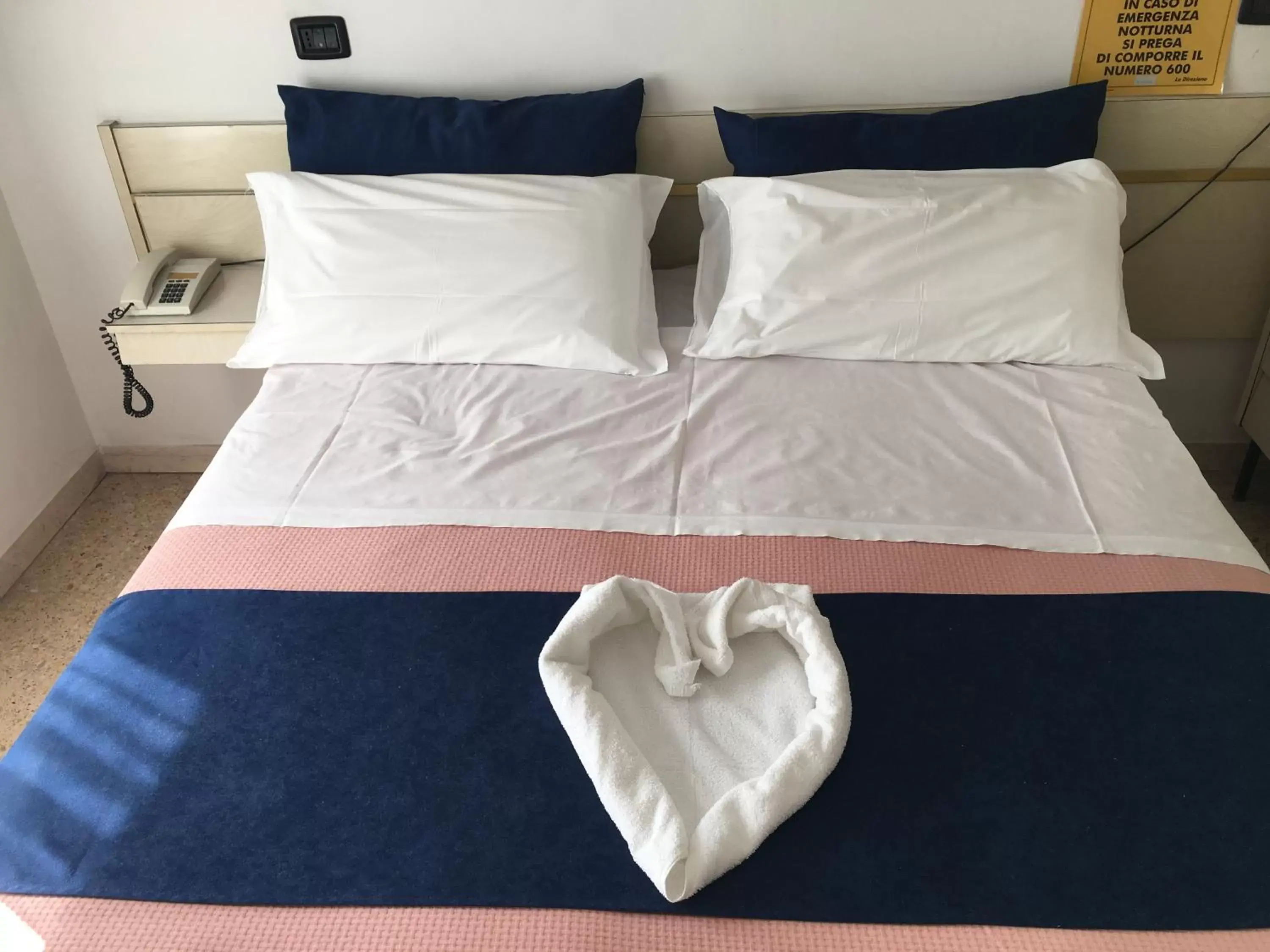 Bed in Dea Della Salute Hotel