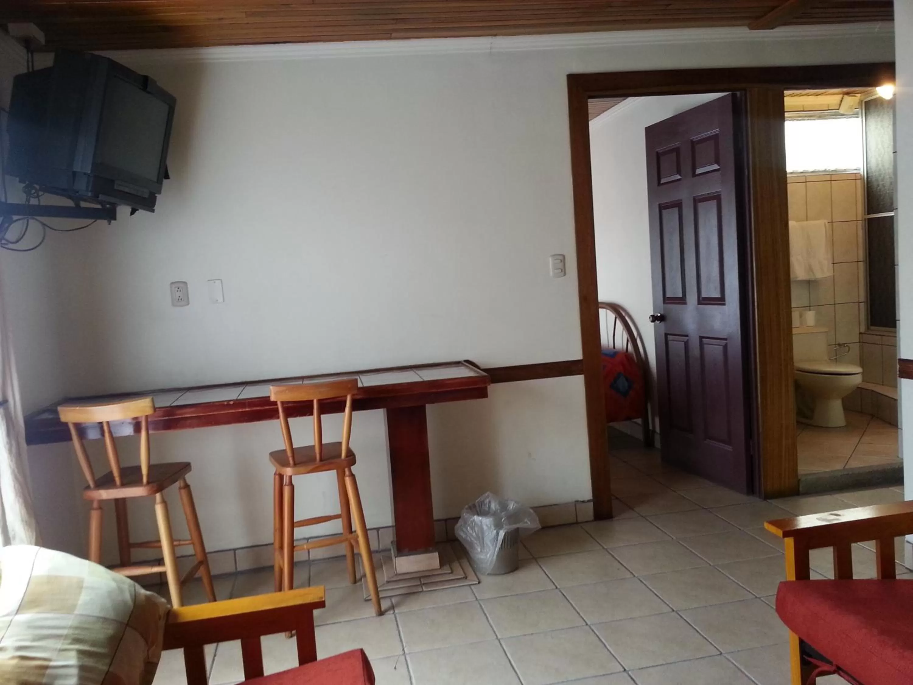 Living room in Hotel La Guaria Inn & Suites