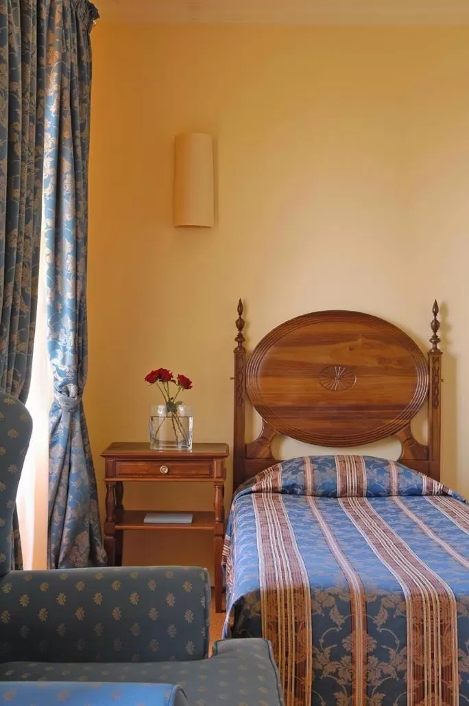 Bed in Hotel do Elevador