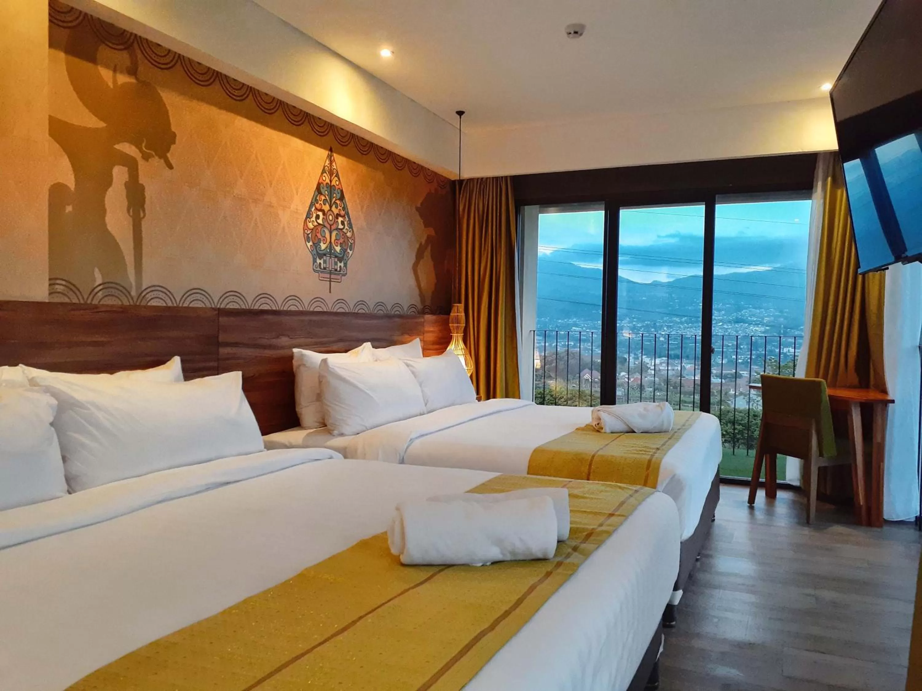 Bed in The Batu Hotel & Villas