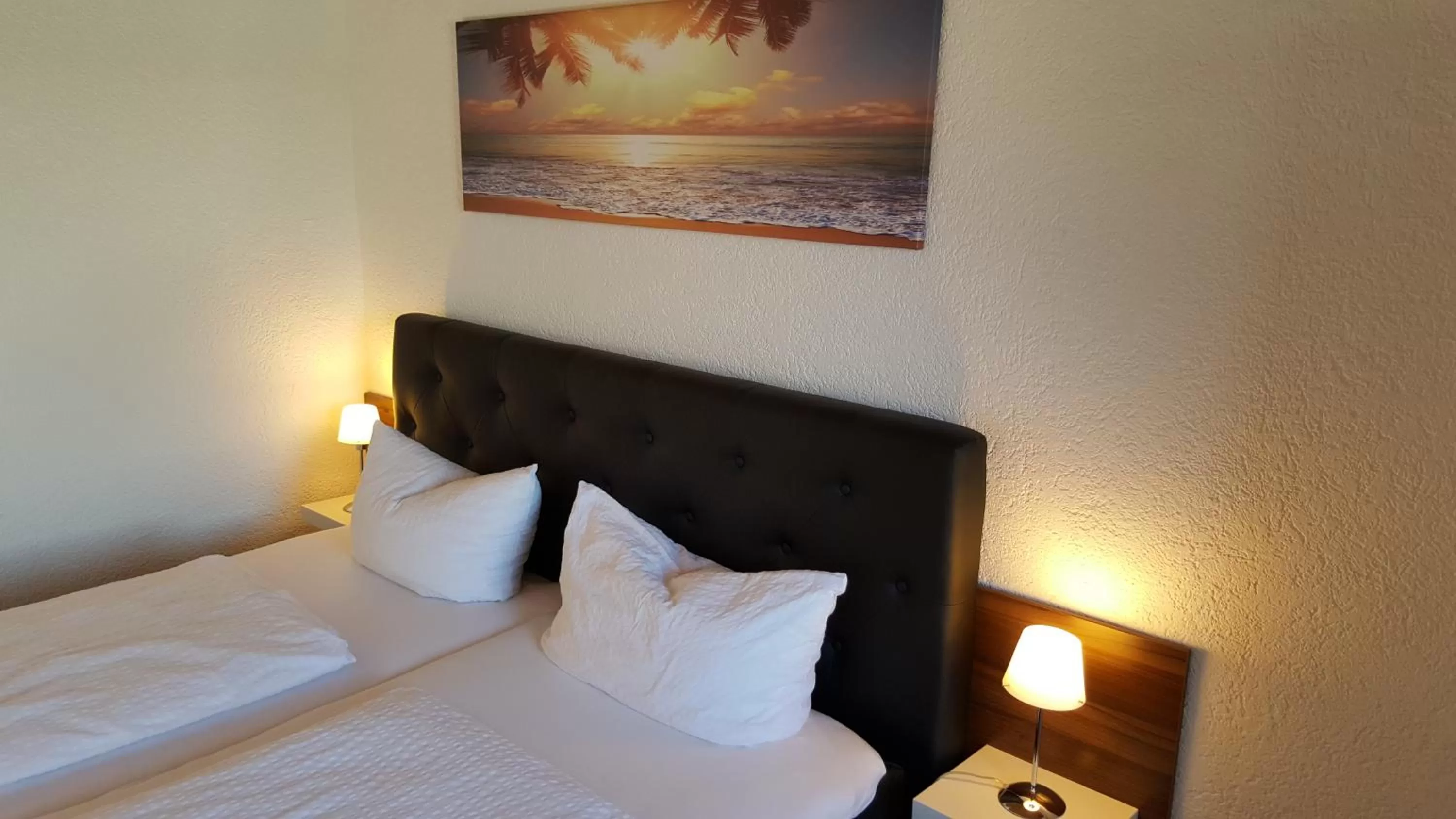 Bed in Hotel Exquisite