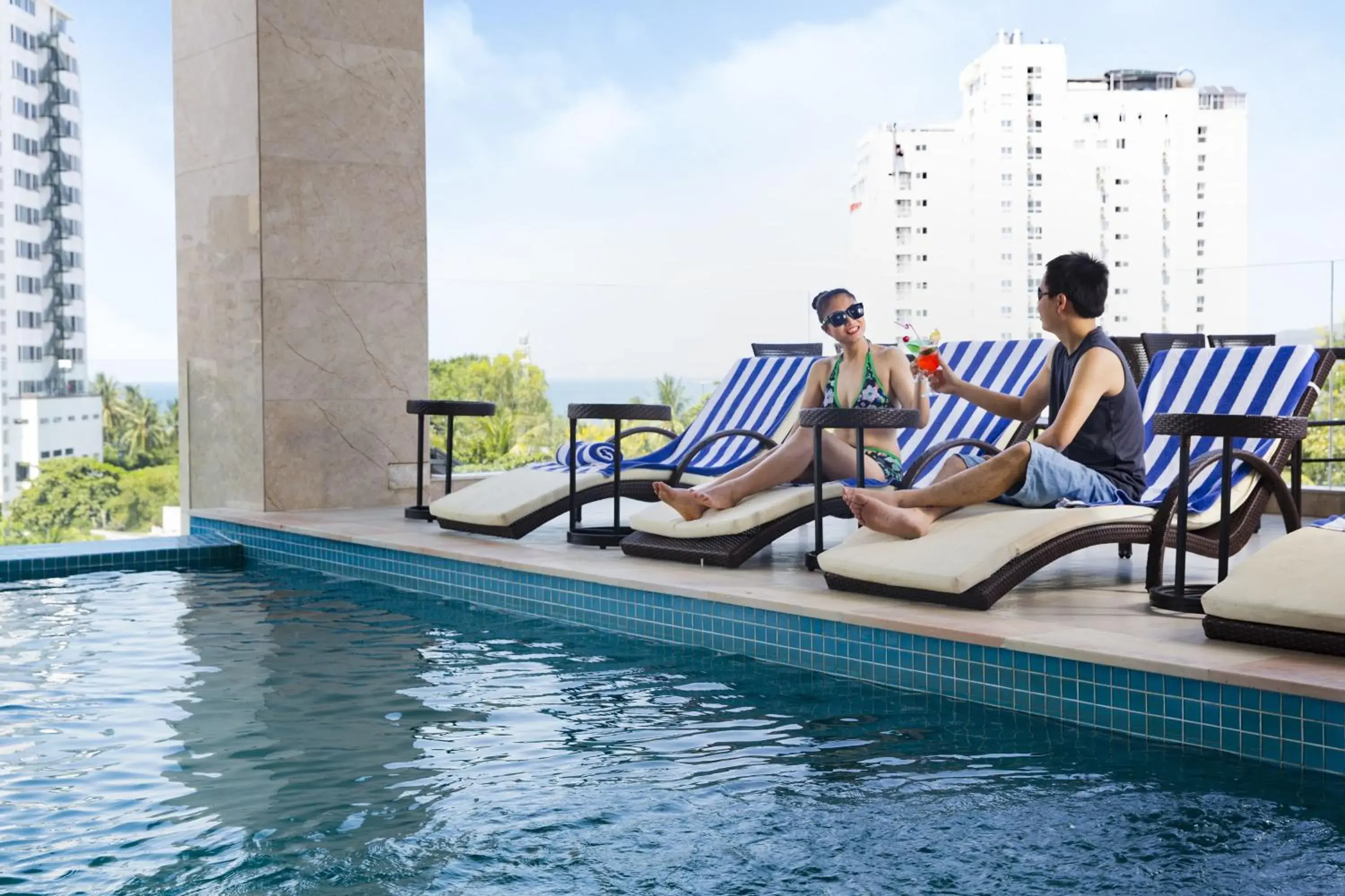 Swimming pool, Guests in Dendro Gold Hotel