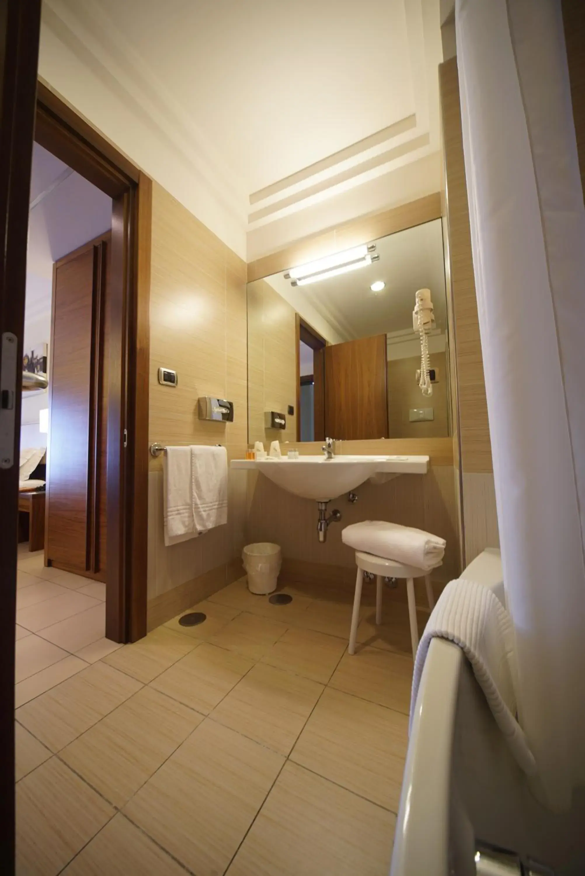 Bathroom in Suites & Residence Hotel