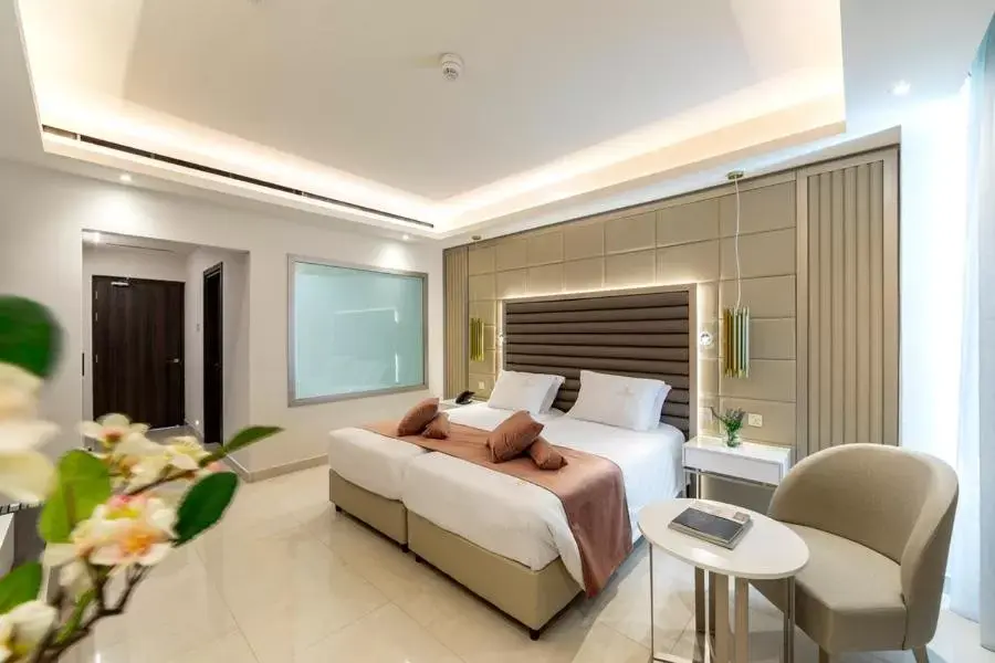 Bed in Chrysomare Beach Hotel & Resort