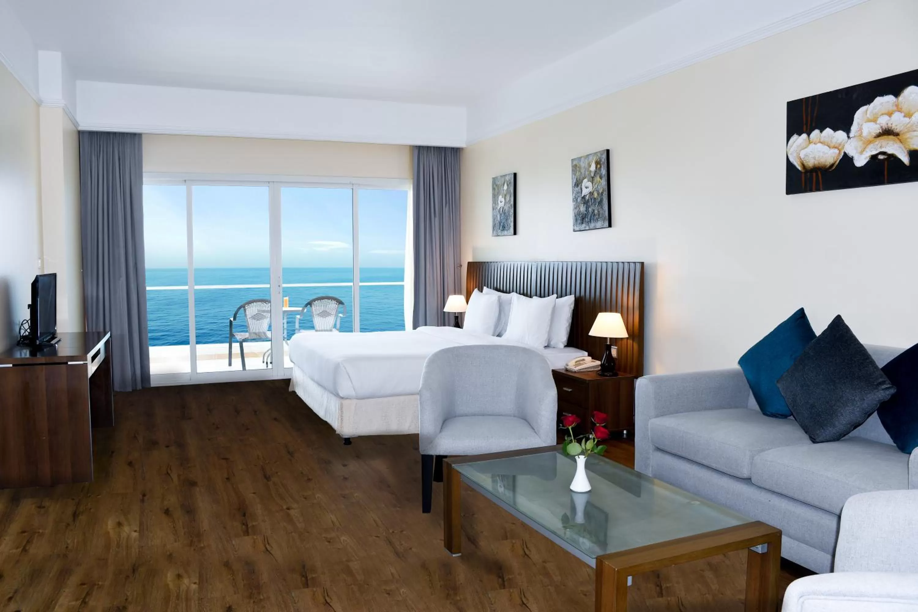 Balcony/Terrace, Bed in Ramada by Wyndham Beach Hotel Ajman