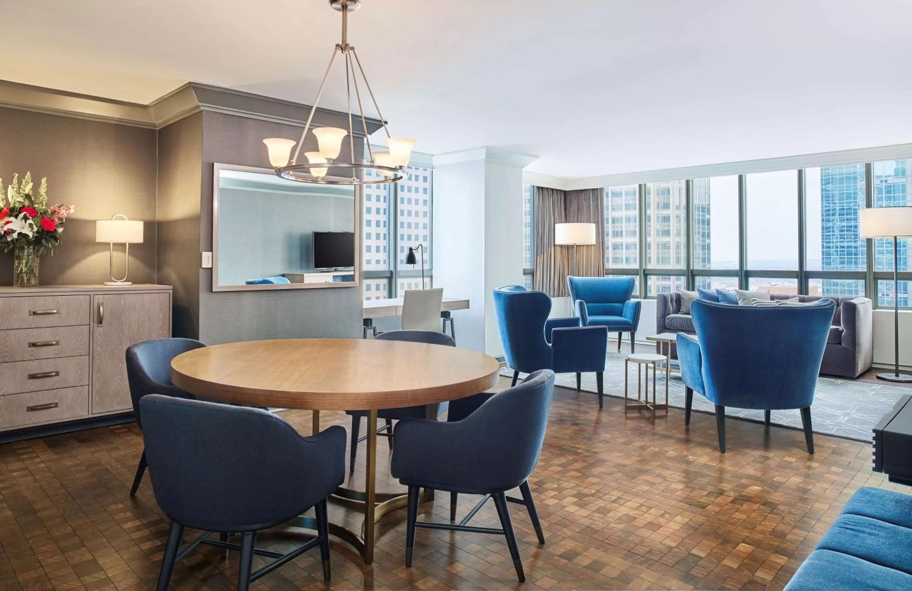 Living room in The Marquette Hotel, Curio Collection by Hilton