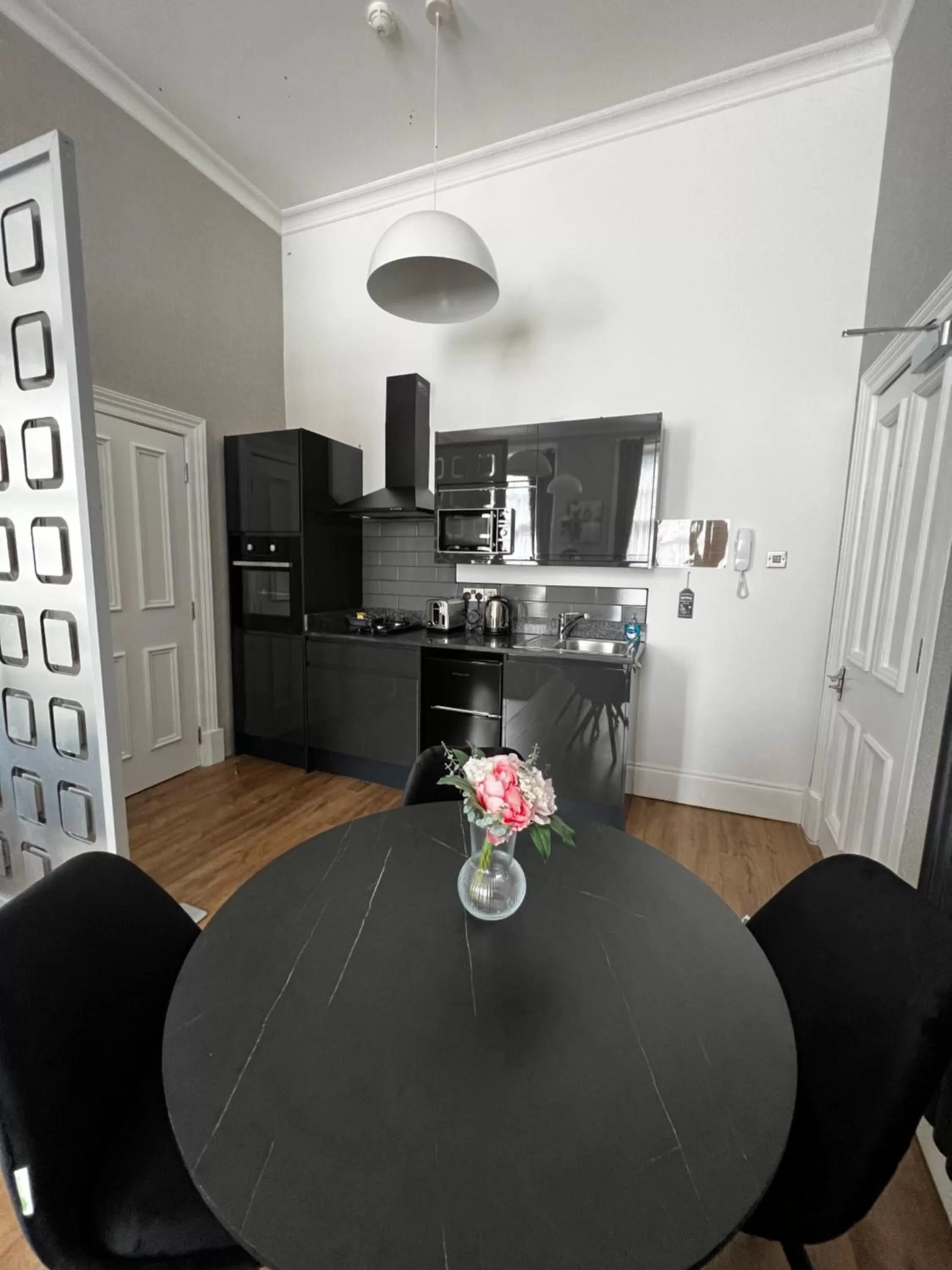 Dining area in Amani Apartments - Glasgow City Centre