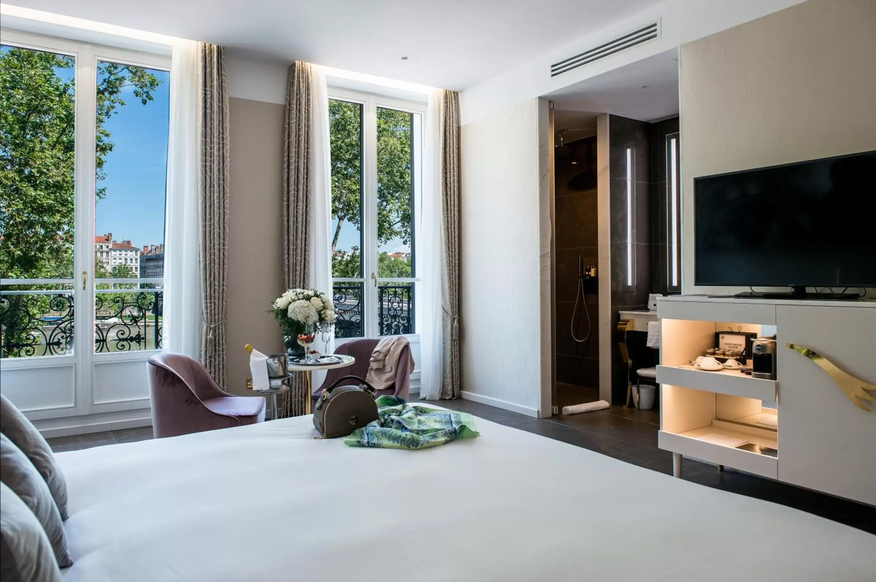 River view, Bed in Boscolo Lyon Hotel & Spa